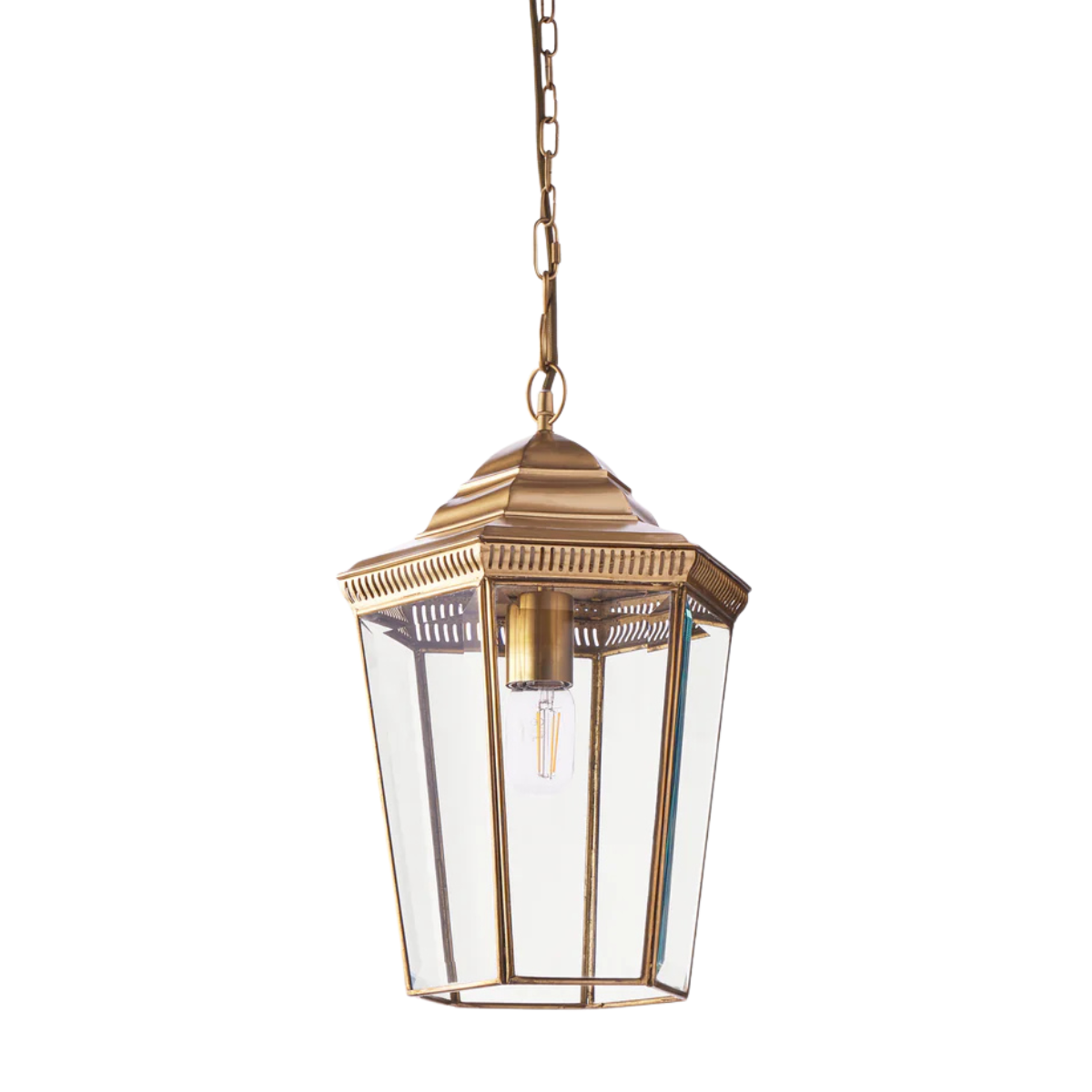 an outdoor lantern pendant in aged brass