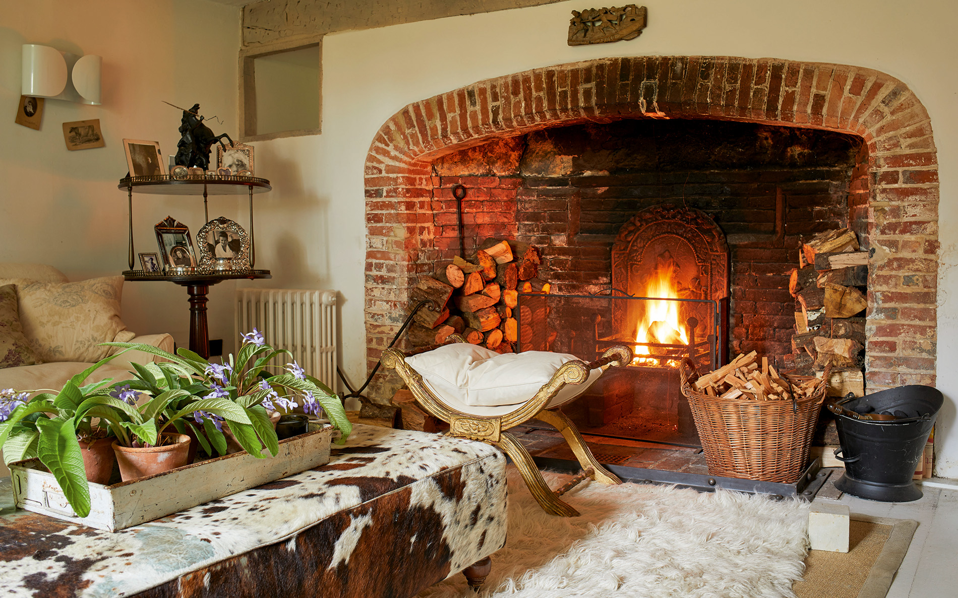 a farmhouse living room with a fire place