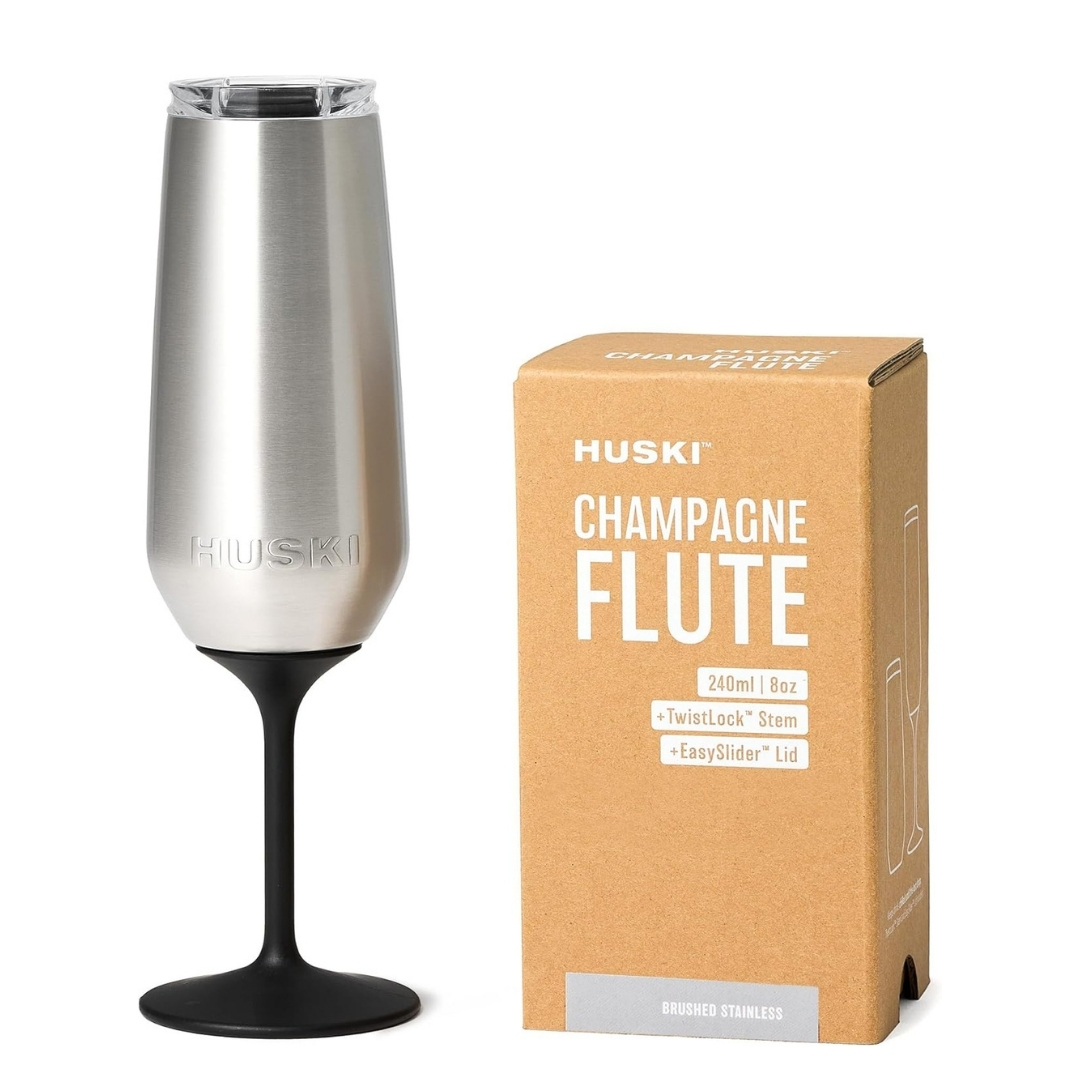 Huski Champagne Flute cooling glasses for champagne prosecco pictured next to box with a white background