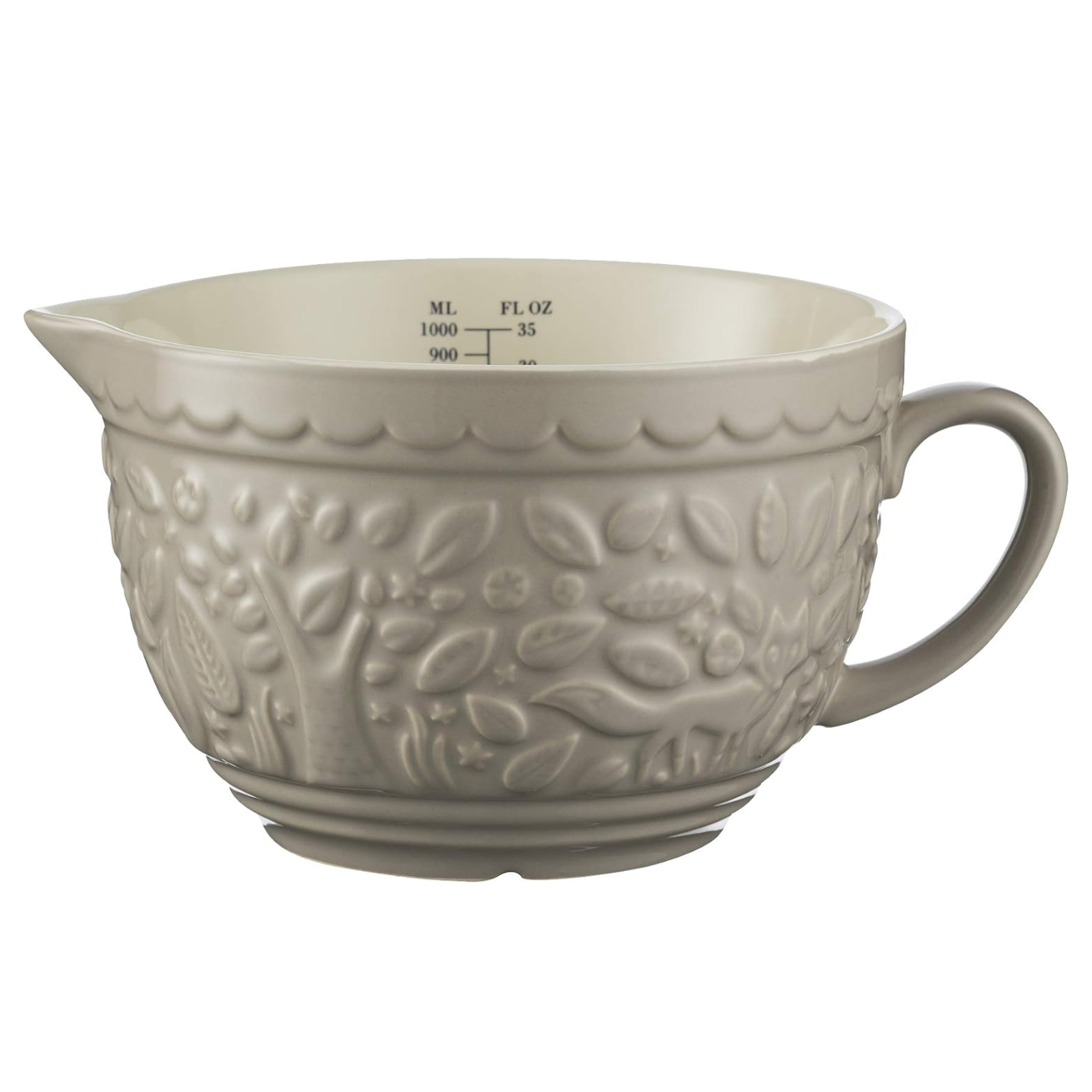 Taupe ceramic Mason Cash batter jug with a side handle, pouring spout, interior measurement markings, and embossed woodland nature motifs around the exterior