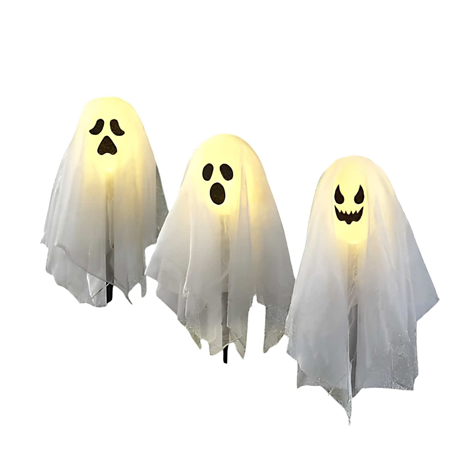 three white ghost stake lights with black scary faces