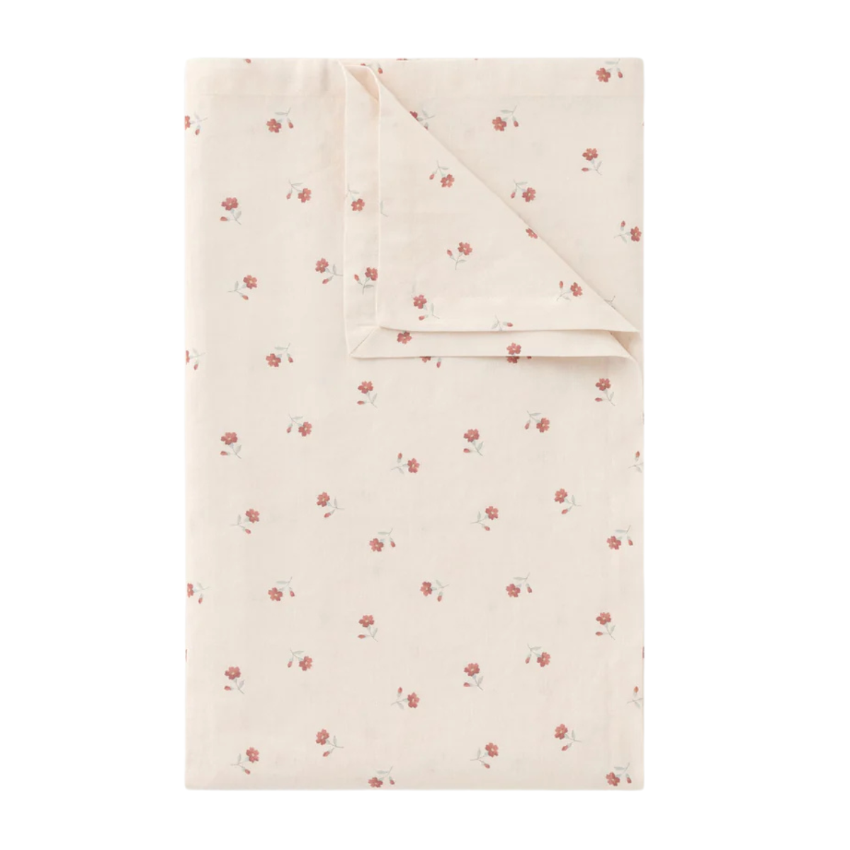 a cream tablecloth covered in pink ditsy flowers