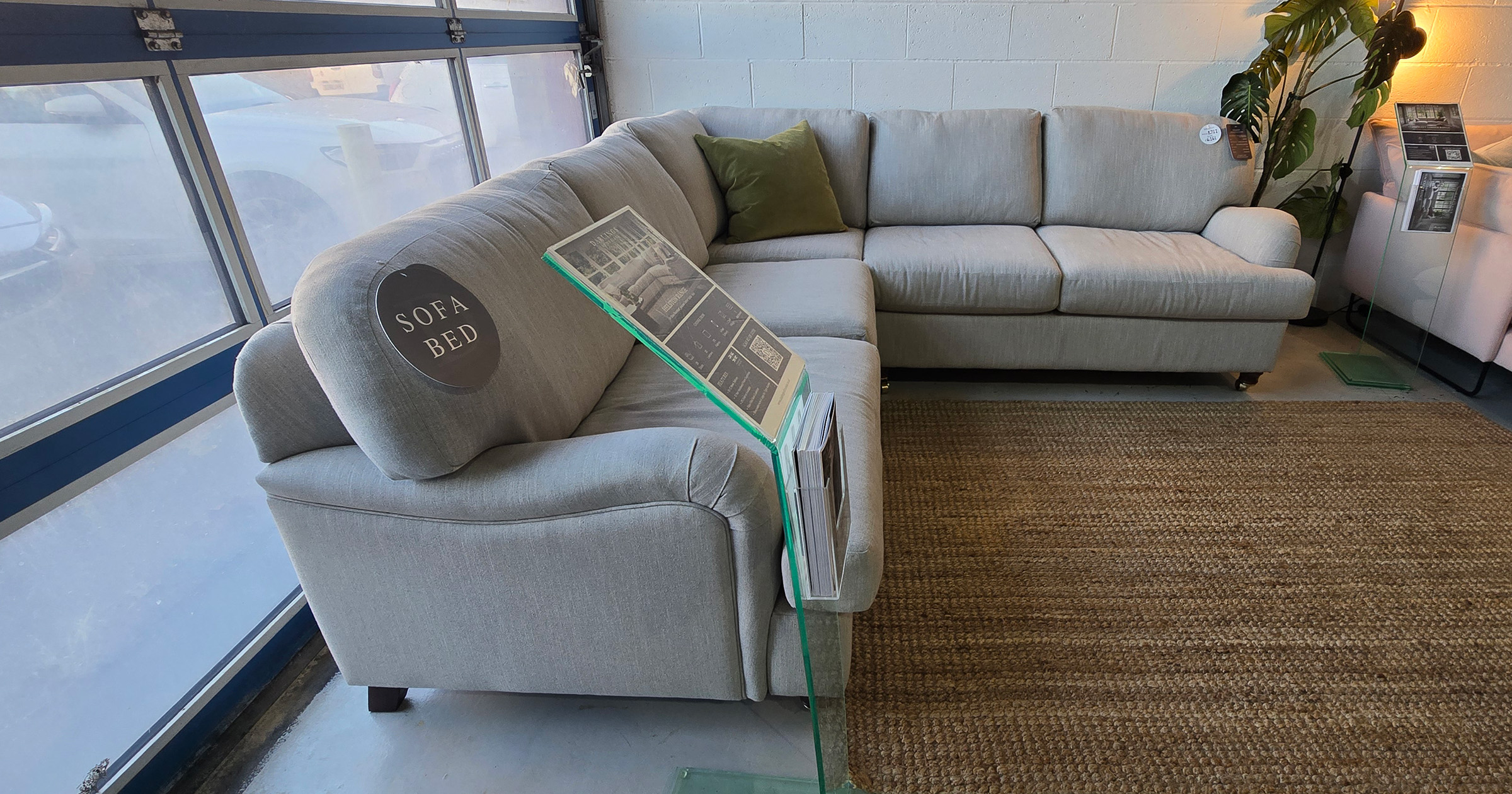 Darlings of Chelsea Helston Corner Sofa Bed pictured in a living room setting in cream