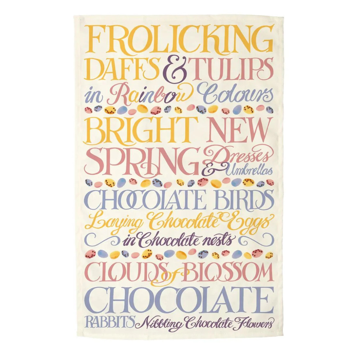 a white tea towel with pastel writing and mini eggs pattern