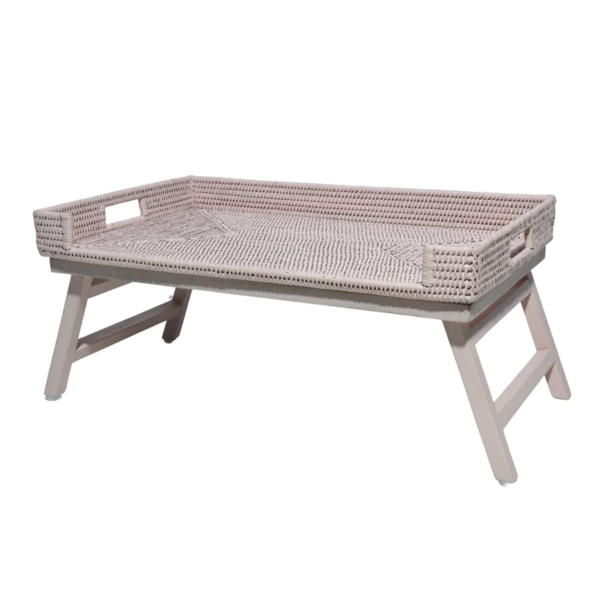 a pale pink rattan breakfast tray on legs