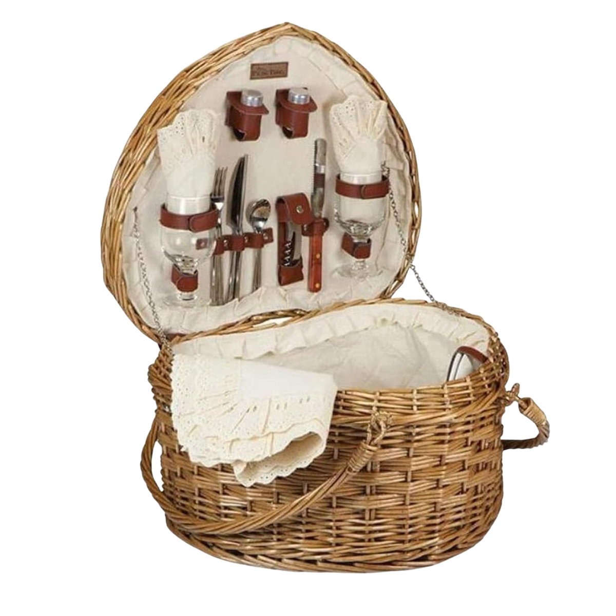 a heart shaped picnic basket with a cream interior and cutlery