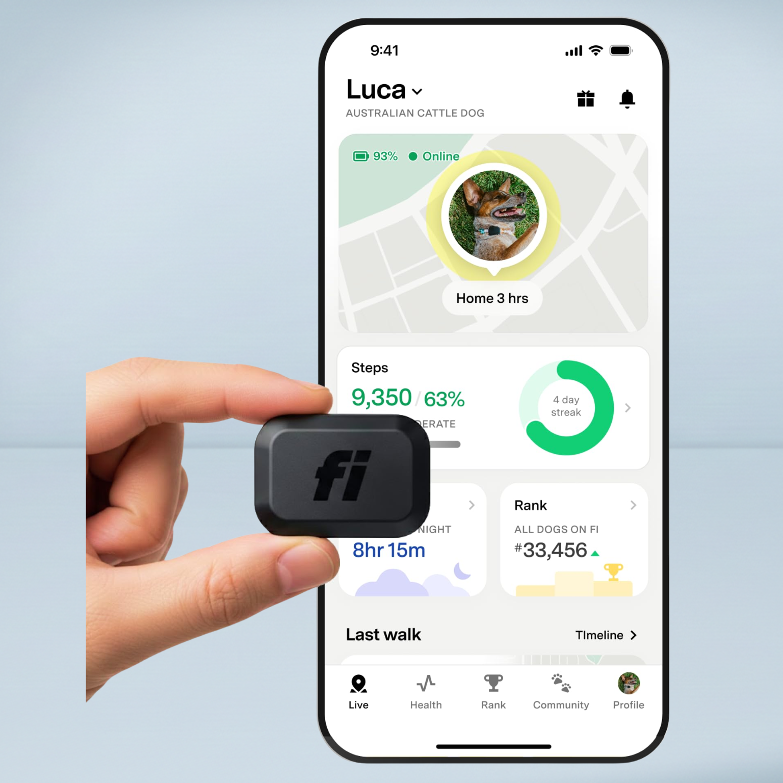fi mini gps tracker being held by a hand in front of an iphone with the fi app running