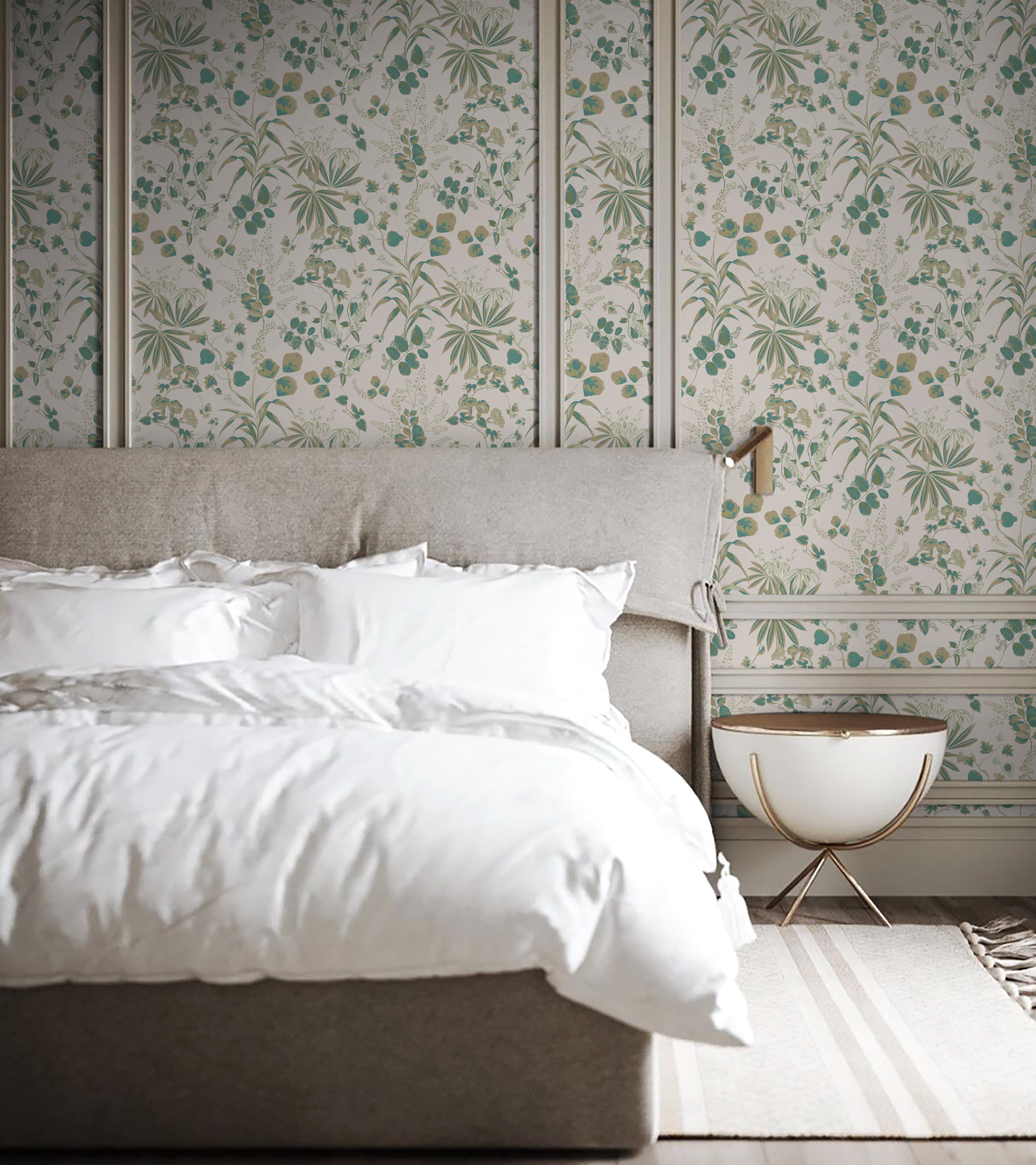a double bed with white bed linen and a grey headboard in front of a white and green wallpapered wall with panelling