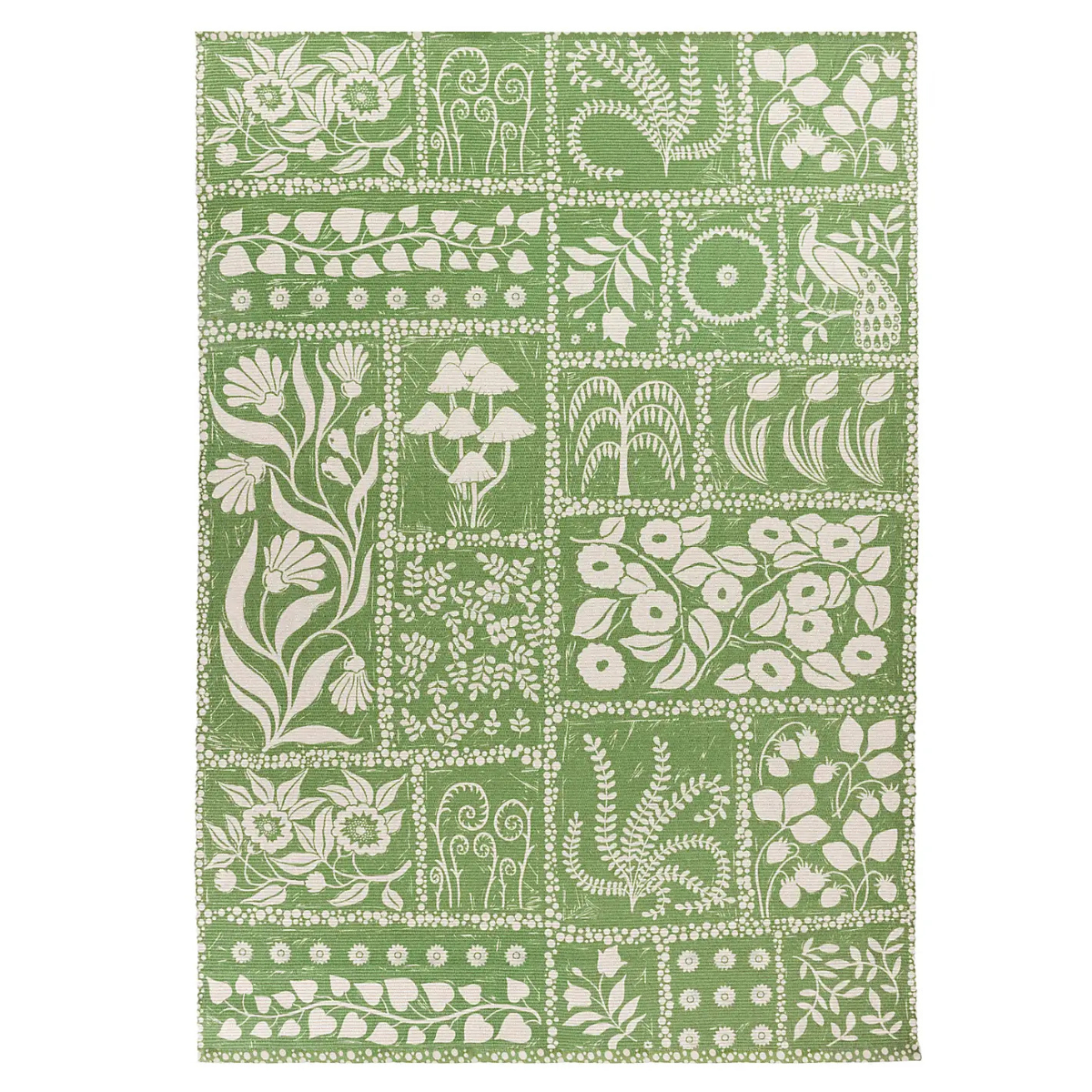 green and white botanical print outdoor rug
