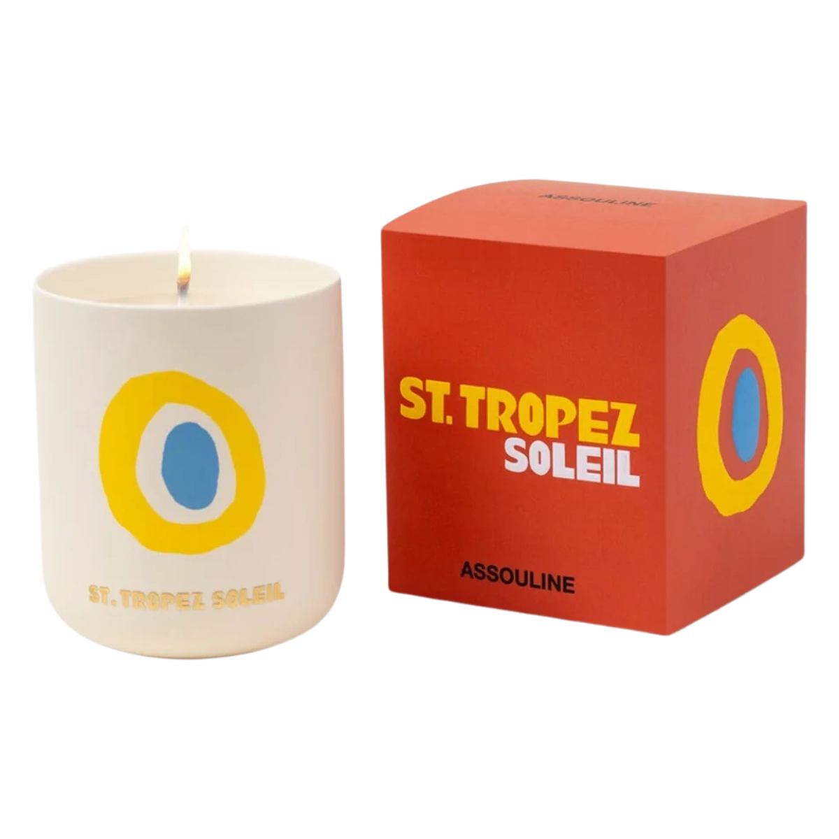 a white ceramic candle with a yellow and blue circle pattern next to a red box