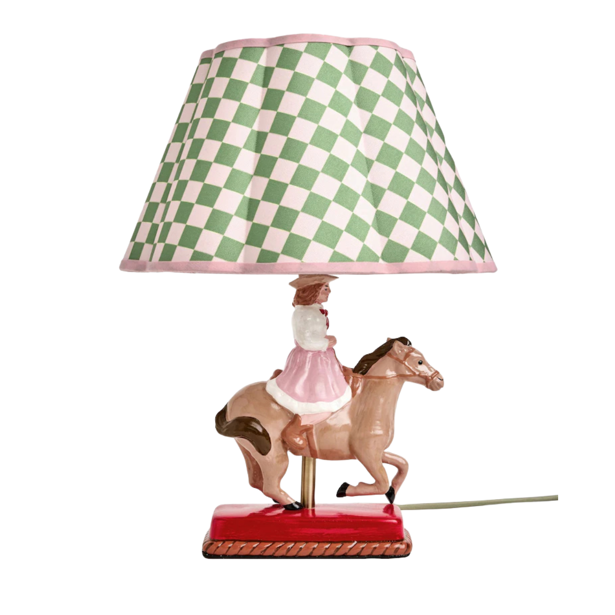 a lamp with a green and white checkerboard shade and a base in the shape of a horse with a girl