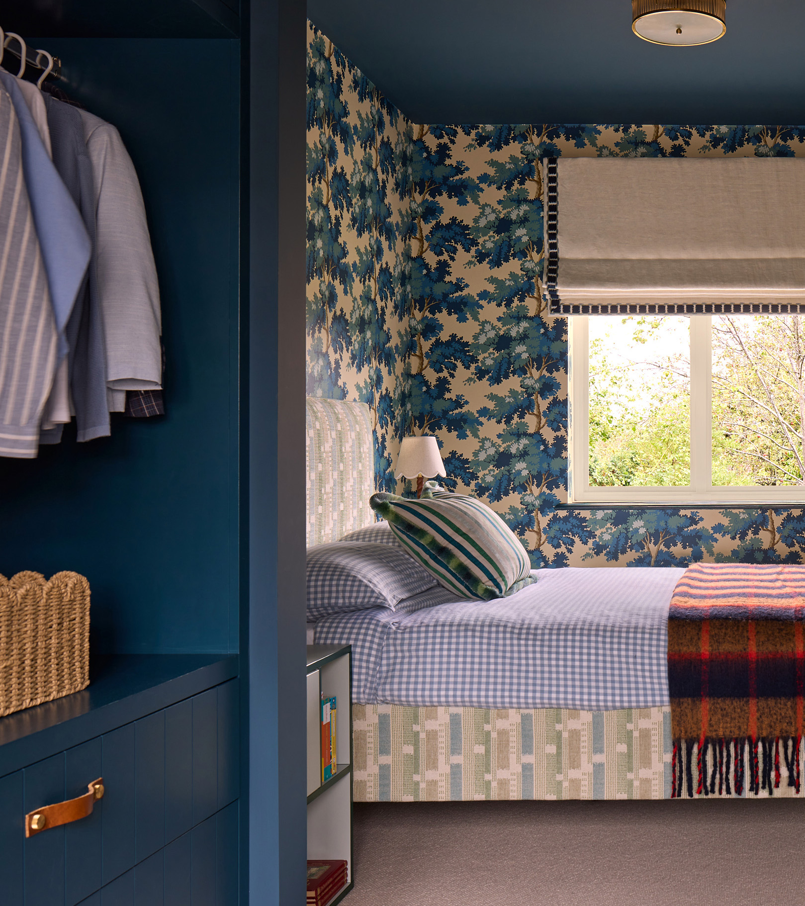 bedroom with blue and white floral wallpaper