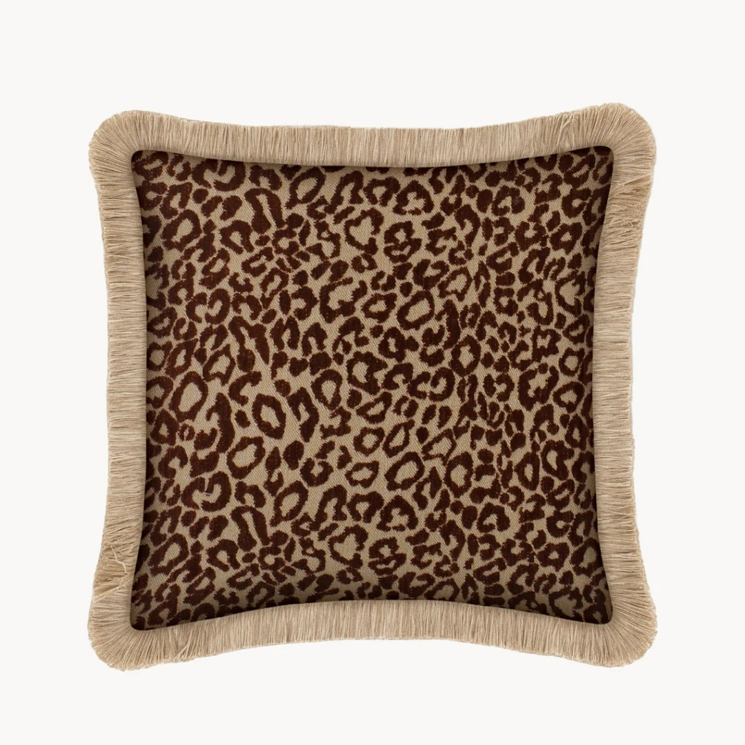 Westwing Maya Handmade Outdoor Cushion leopard print pictured on a white background