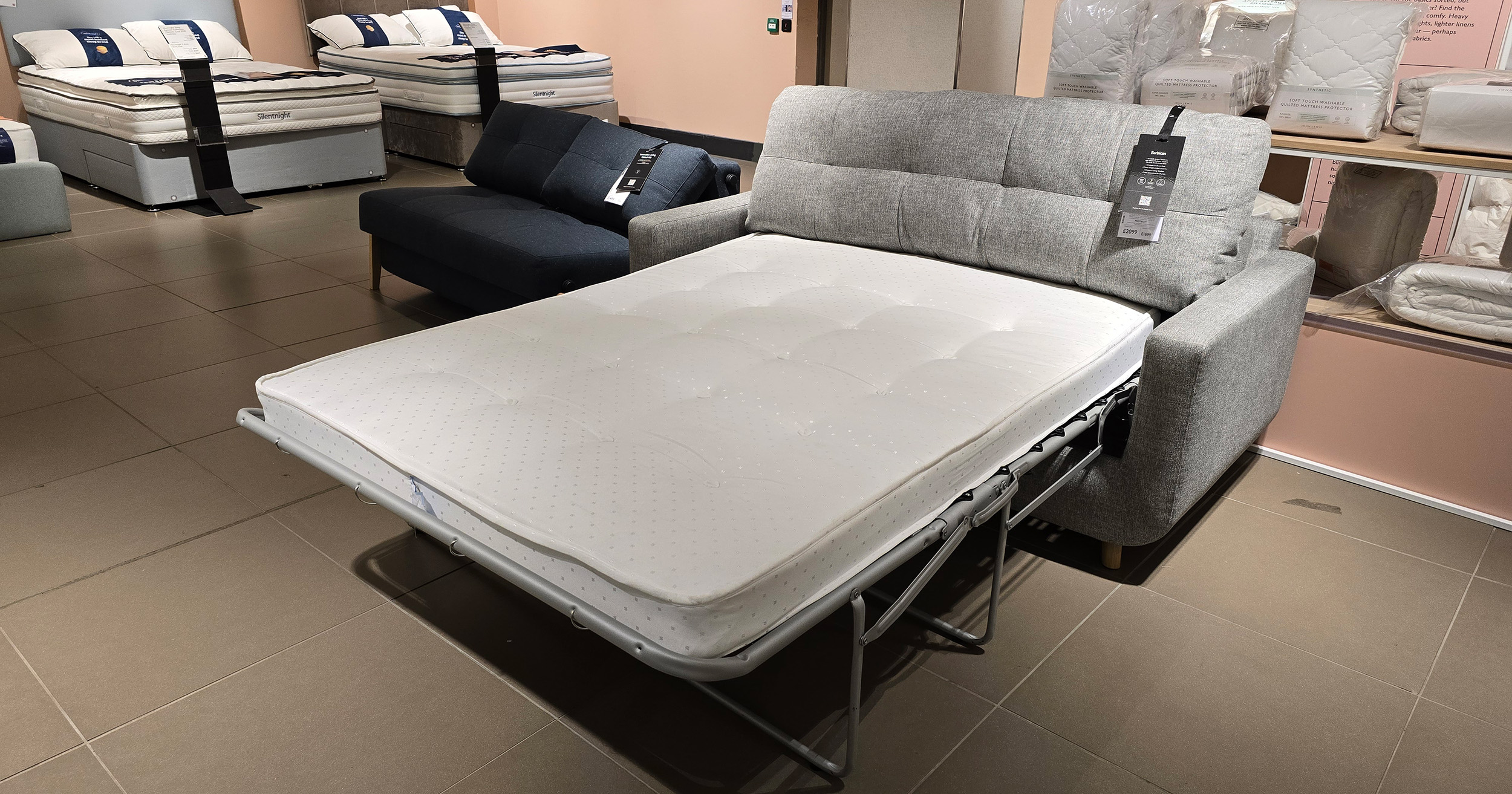 john lewis sofa bed pictured in grey with the mattress unfolded