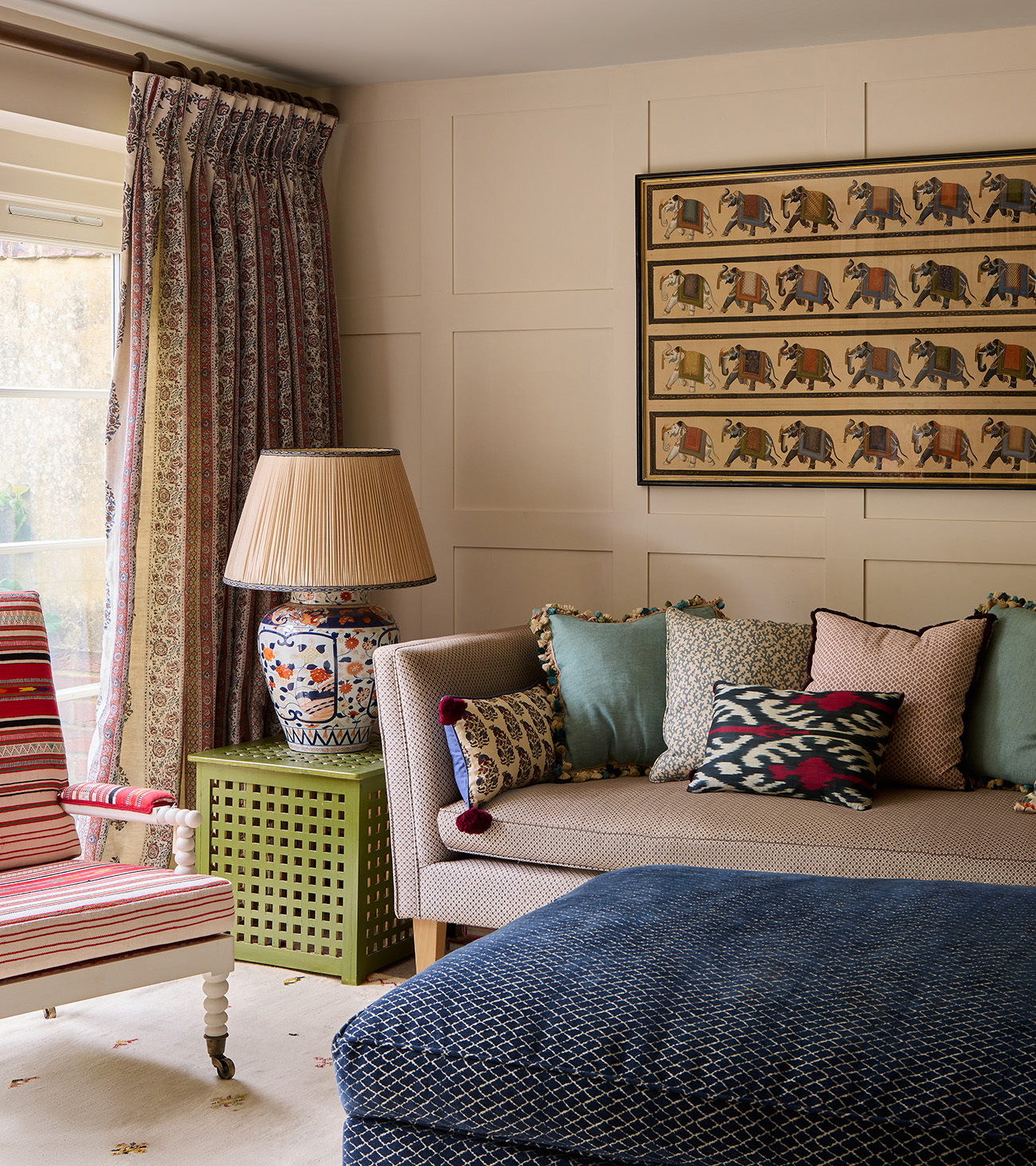 a living room with neutral walls 