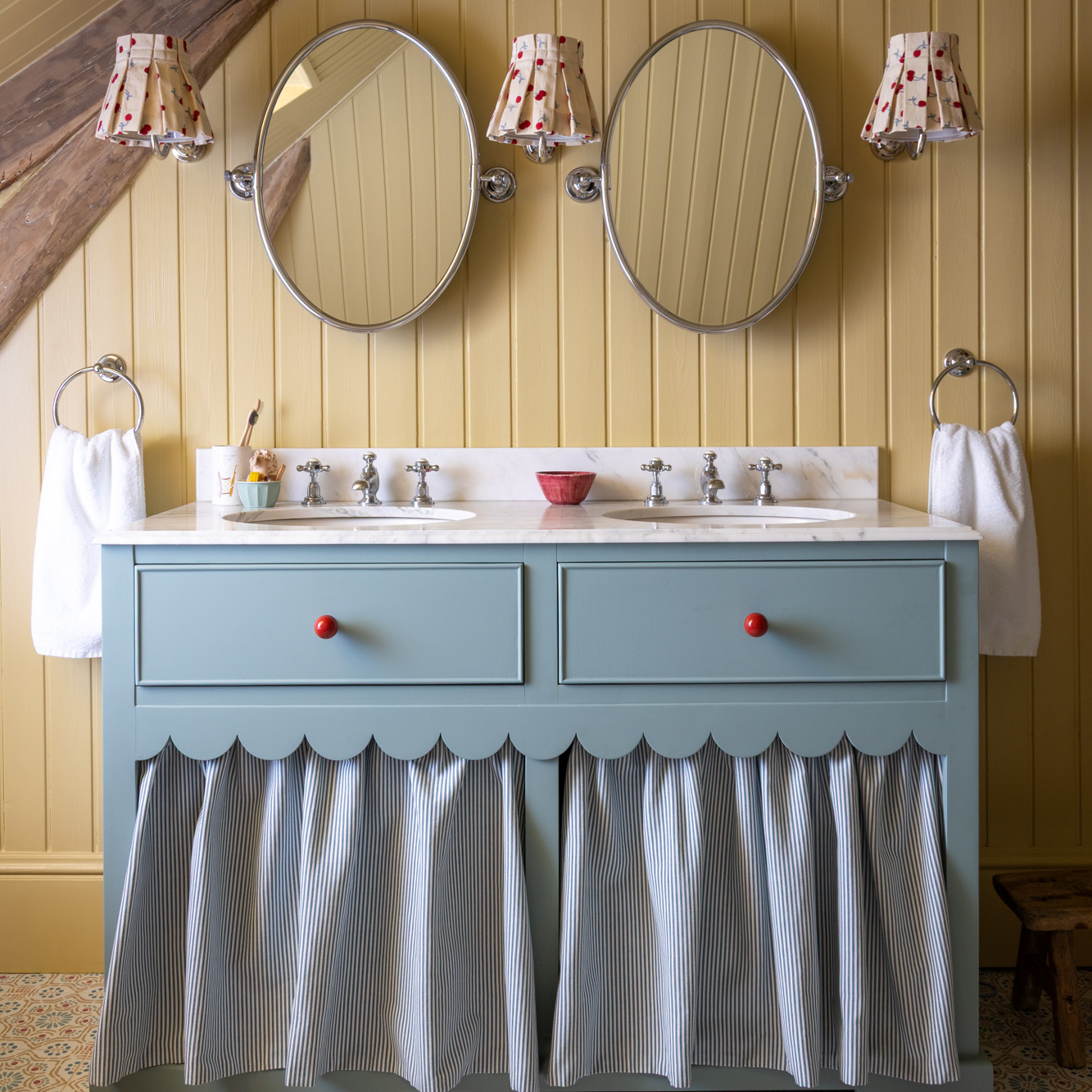 yellow bathroom blue vanity