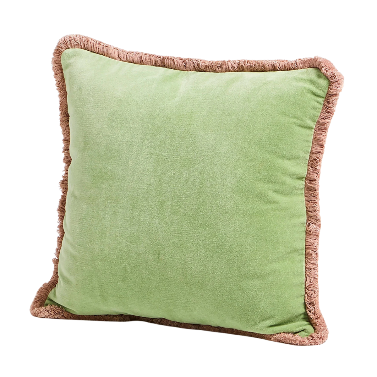 a pale green velvet cushion with a pale pink fringed trim