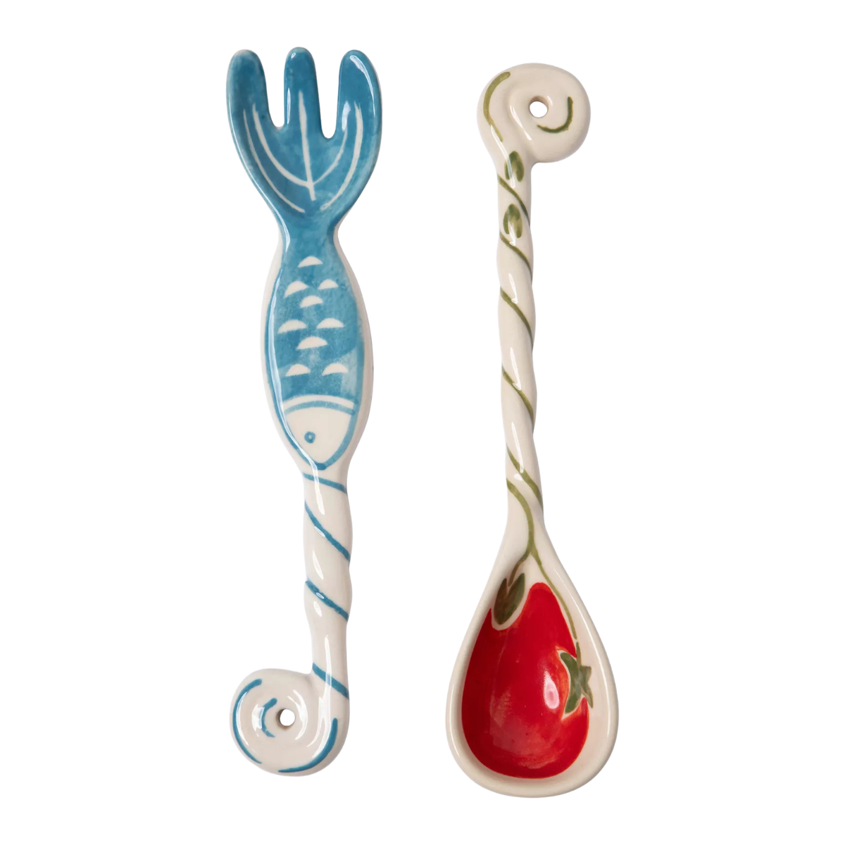 a set of two salad servers, one white and blue stripe with a fish shaped fork and one in white and green with a tomato shape spoon