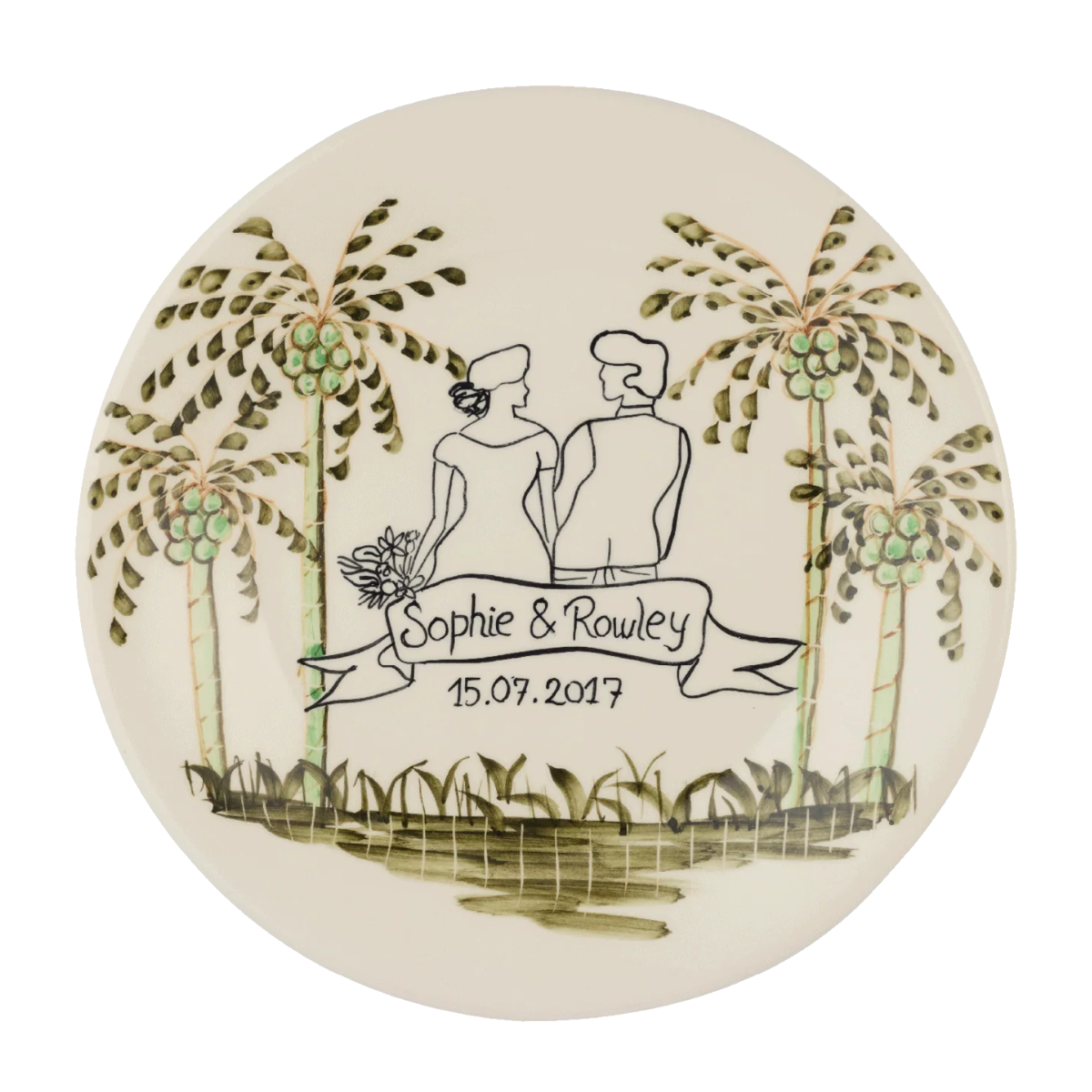 a cream plate with palm trees and bride and groom illustration with personalized name and date