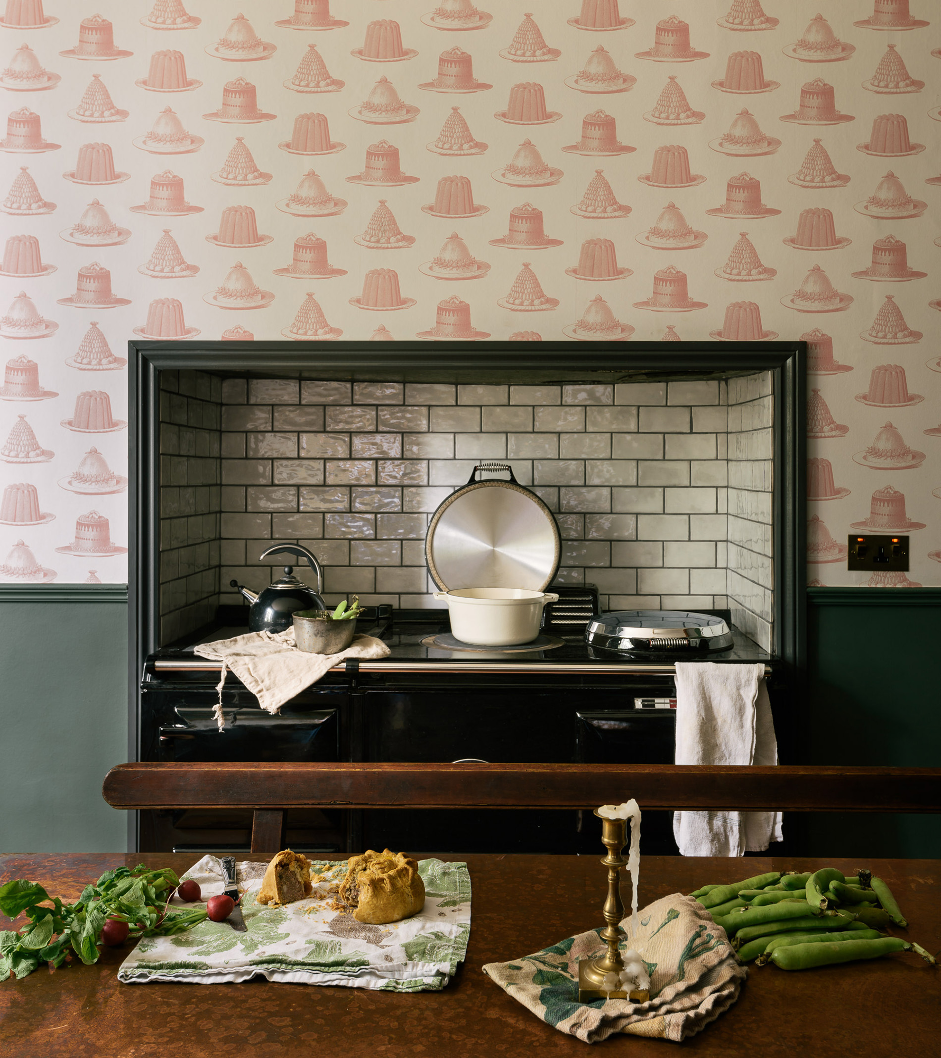 a range cooker with patterned wallpaper