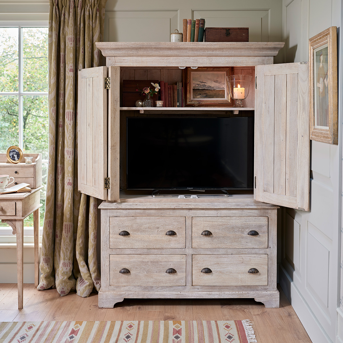 Susie Watson cabinet to hide television