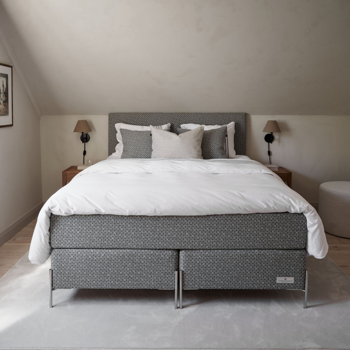 carpe diem bed in a neutral white bedroom