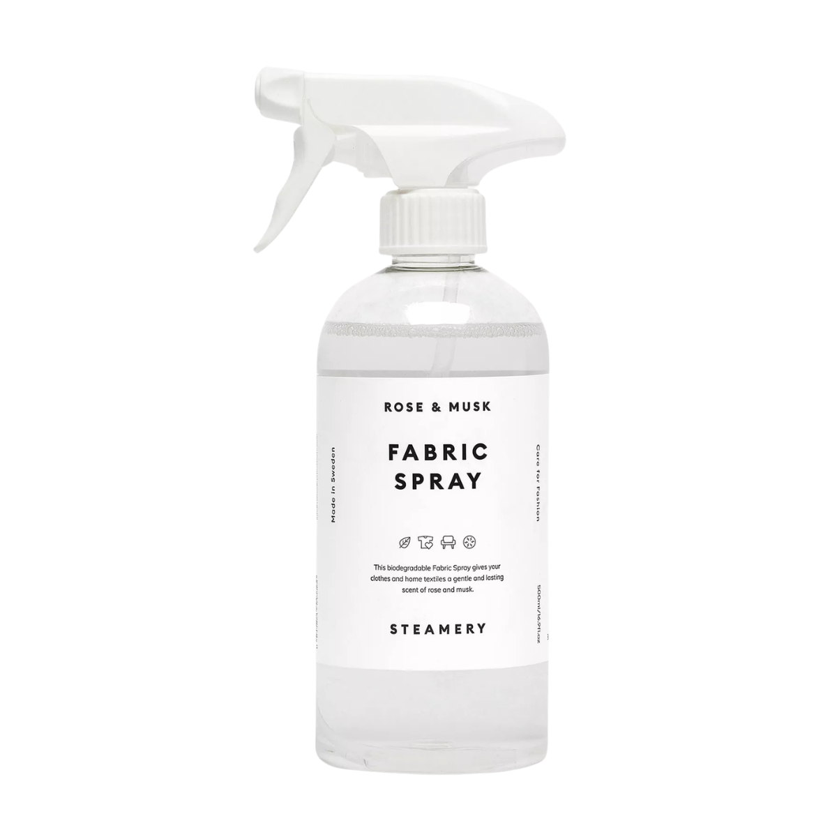 a clear bottle of rose and musk fabric spray with a white nozzle and a white label with black writing