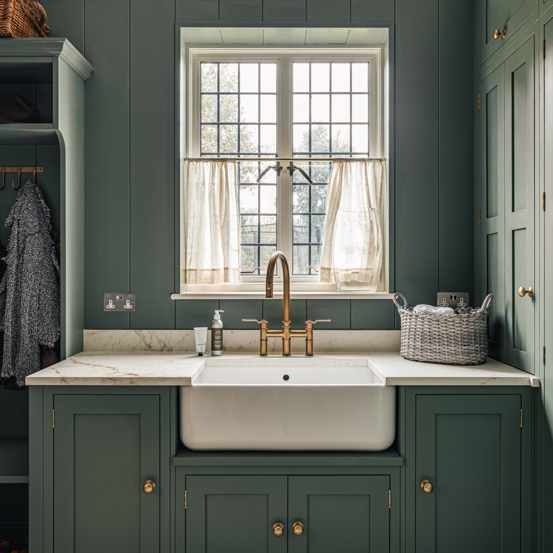 Farrow & Ball’s Green Smoke paint colour pictured in david gandys boot room
