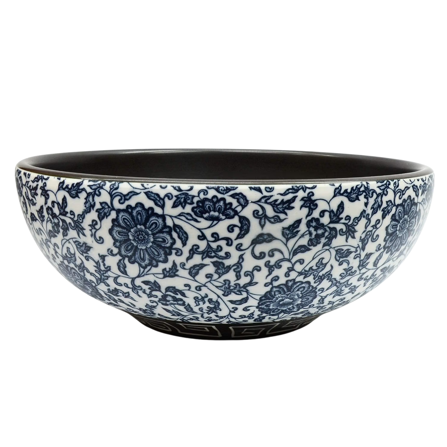a white and dark blue floral ceramic sink basin with a black interior