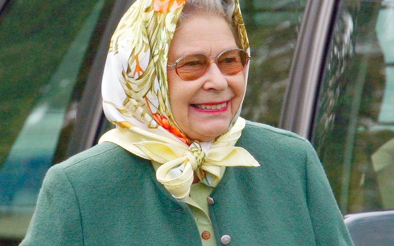 Queen Elizabeth II watching Prince Philip, compete at the Royal Windsor Horse Show on May 17, 2002