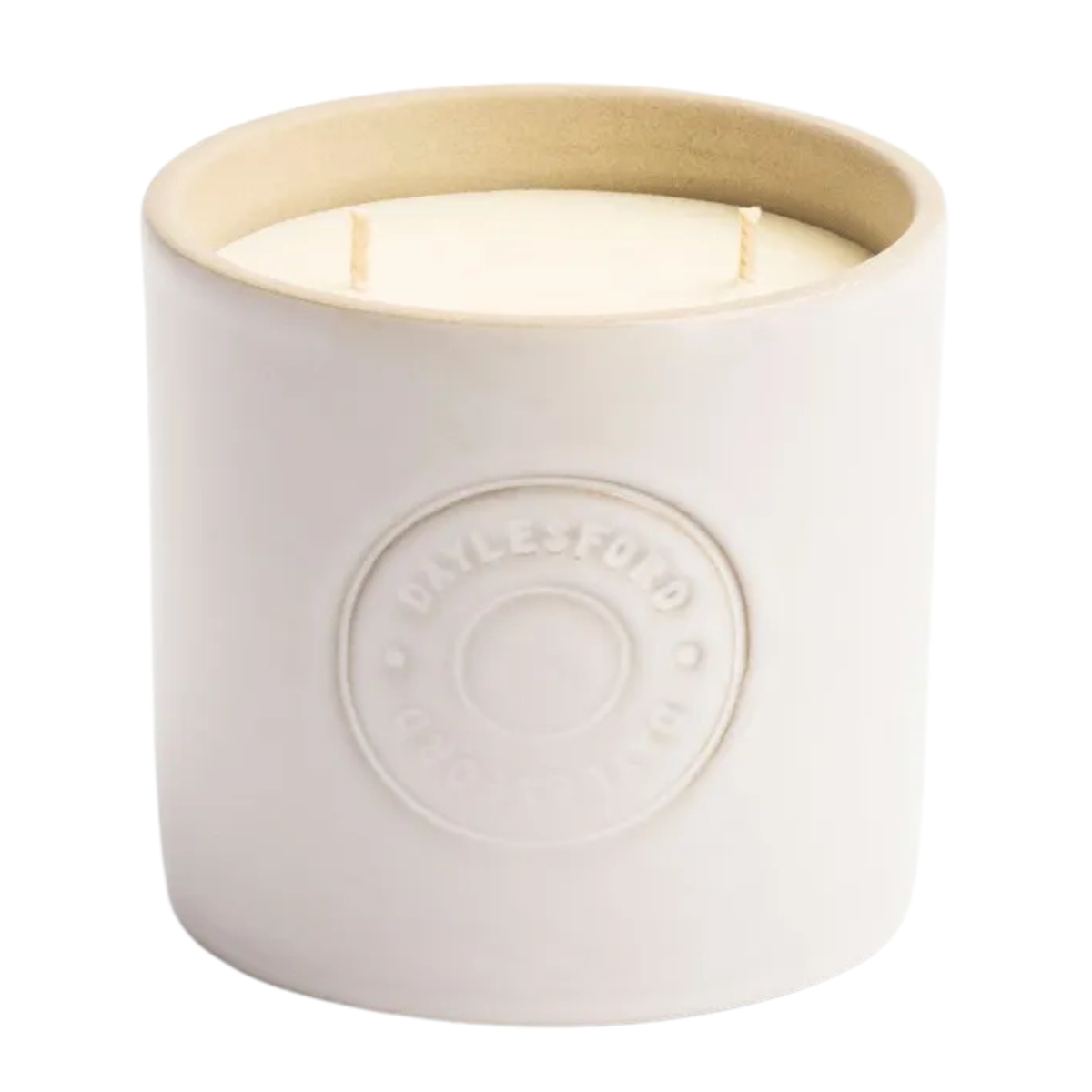 a cream ceramic candle