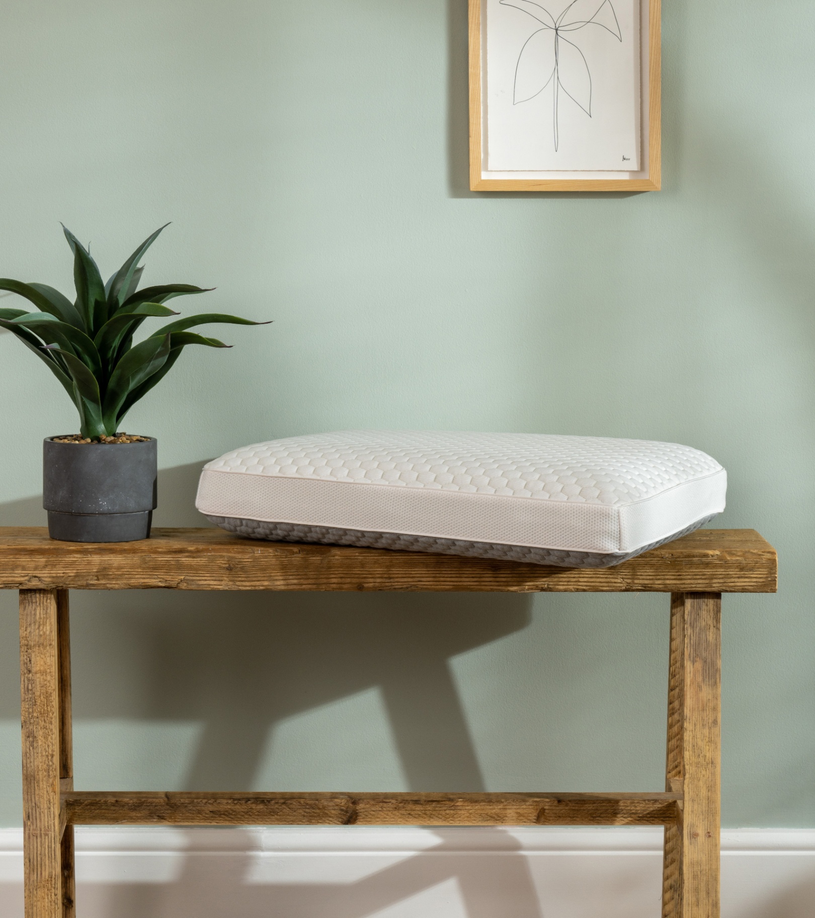 Memory Foam Cooling Pillow on a wooden bench