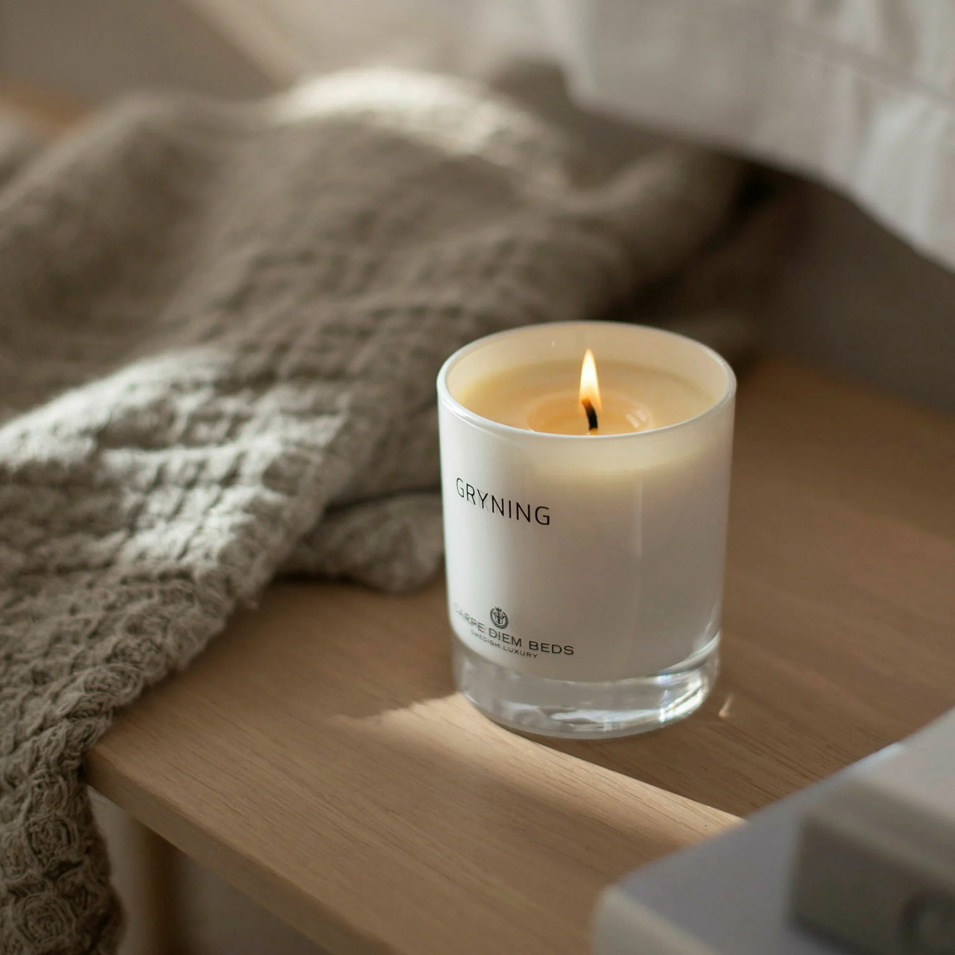 gryning candle carpe diem beds