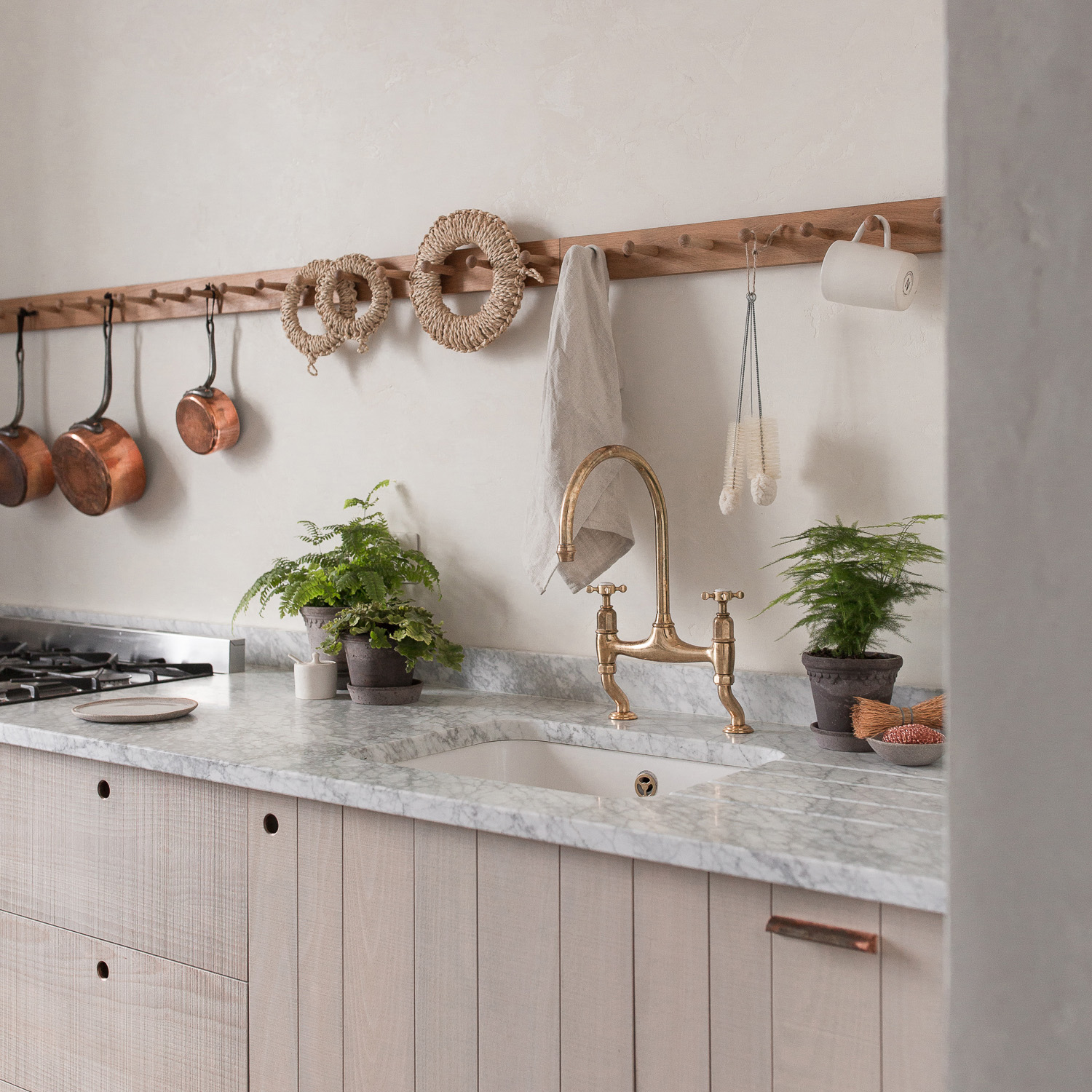 devol wood and marble kitchen with pegrail