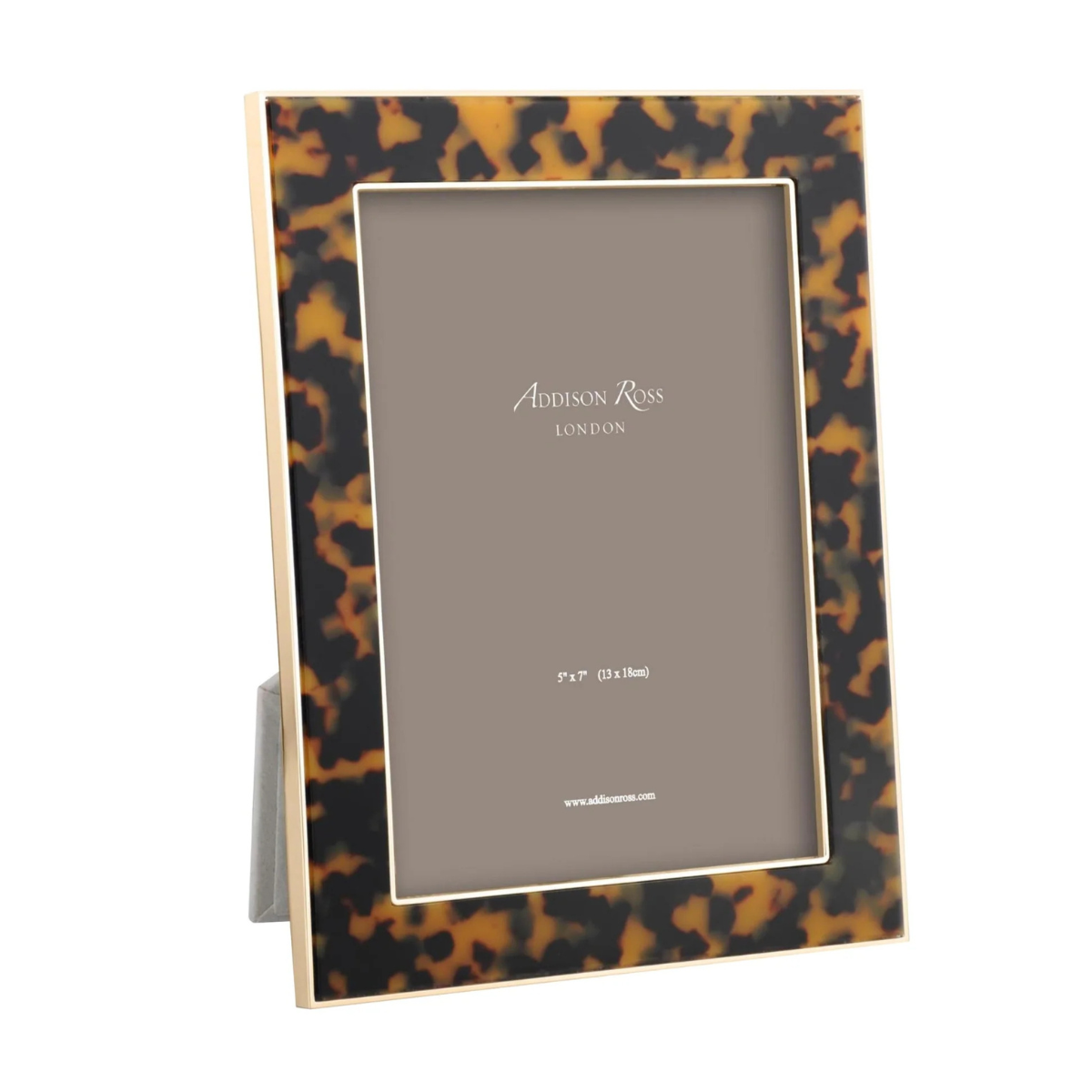 a brown tortoise shell photo frame