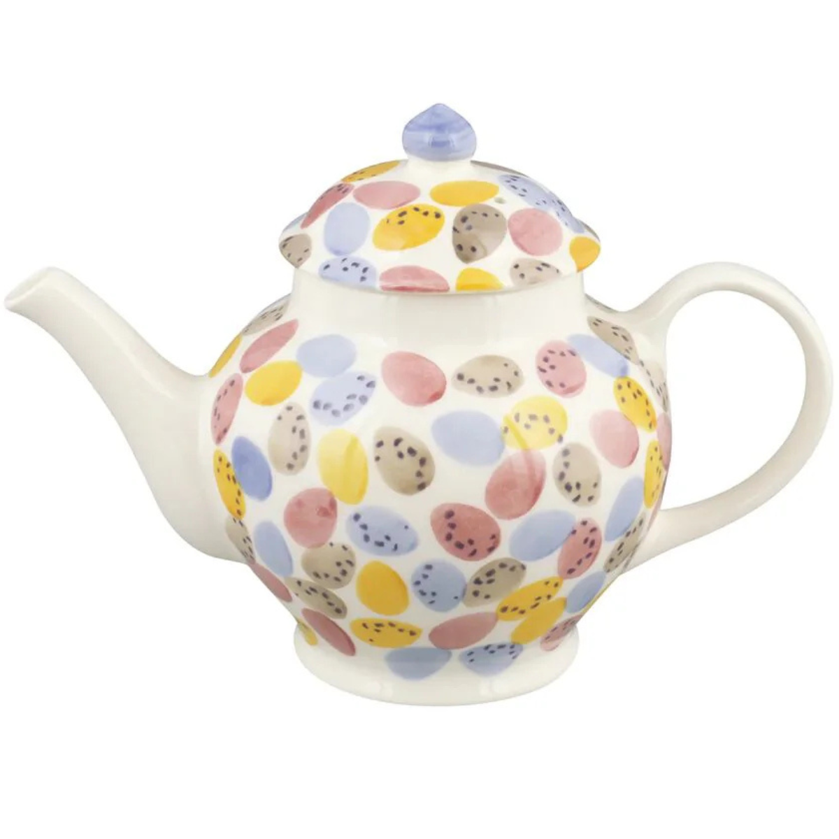 white tea pot with mini eggs pattern