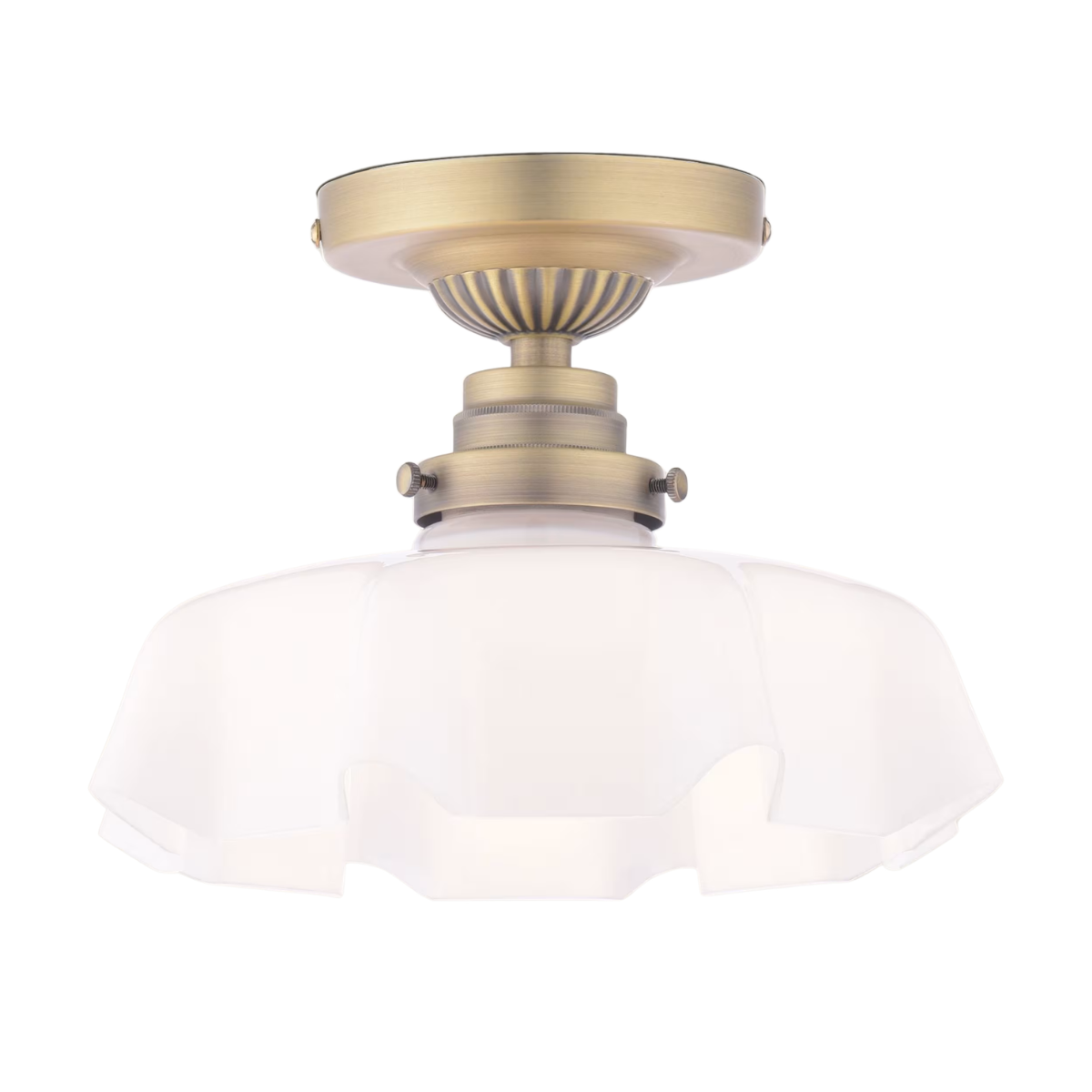 a semi flush ceiling light with a white ruffled glass shade and brass hardware