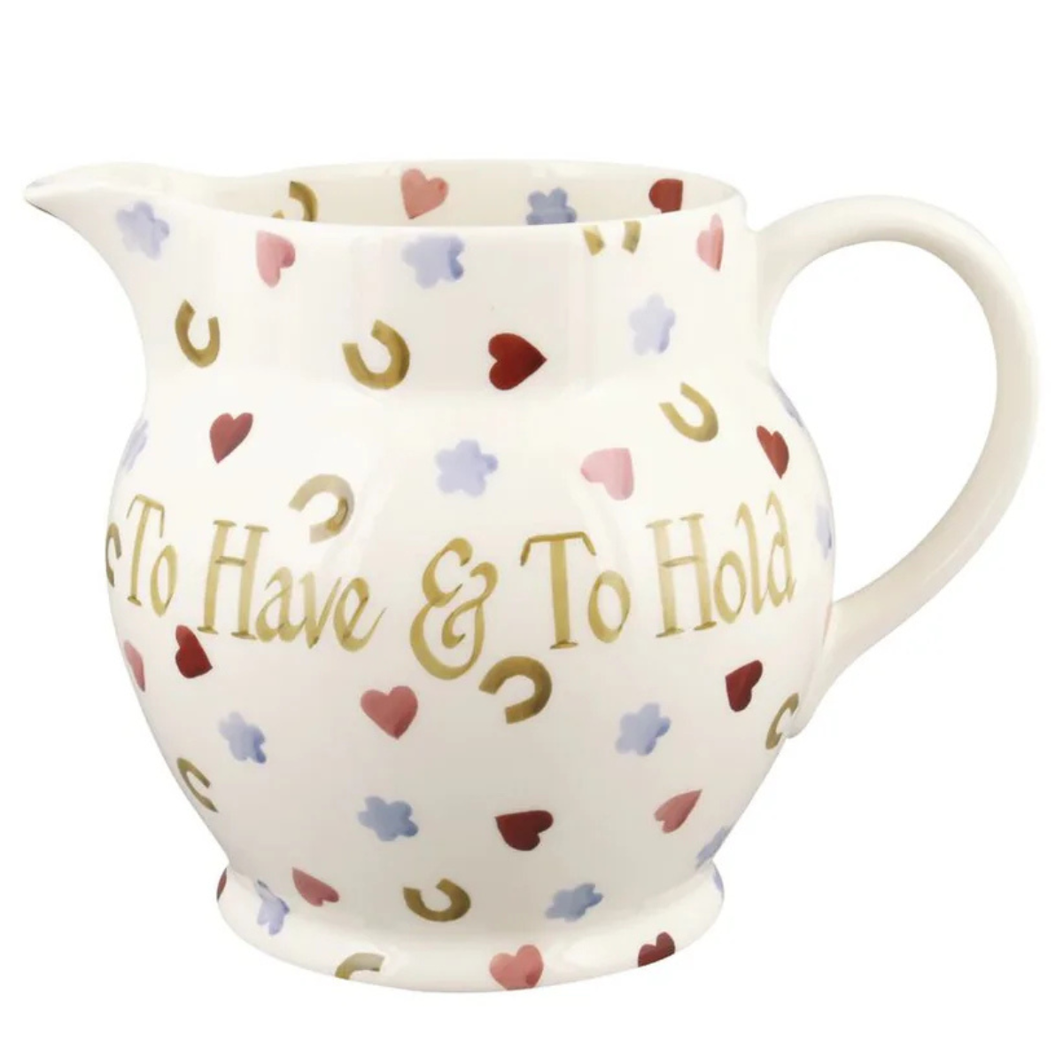 a cream ceramic jug vase with red, blue and gold hearts and horseshoes
