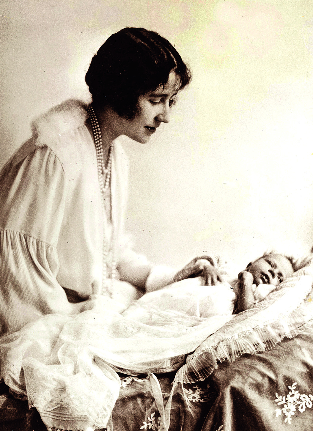 Princess Elizabeth as a baby with her mother, the Duchess of York