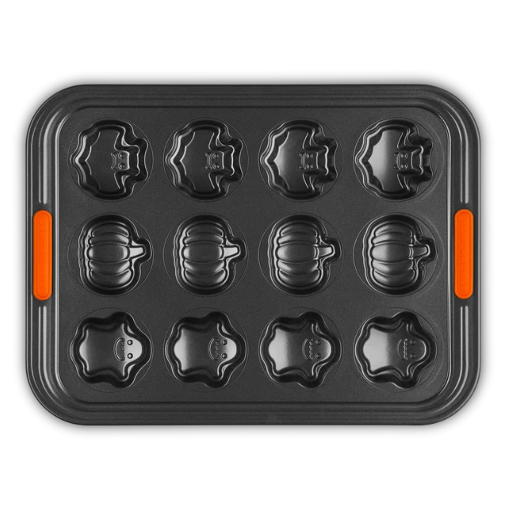 Dark grey non-stick metal baking tray with 12 Halloween-themed muffin wells, featuring rows shaped like bats, pumpkins, and ghosts, complete with orange silicone side grips