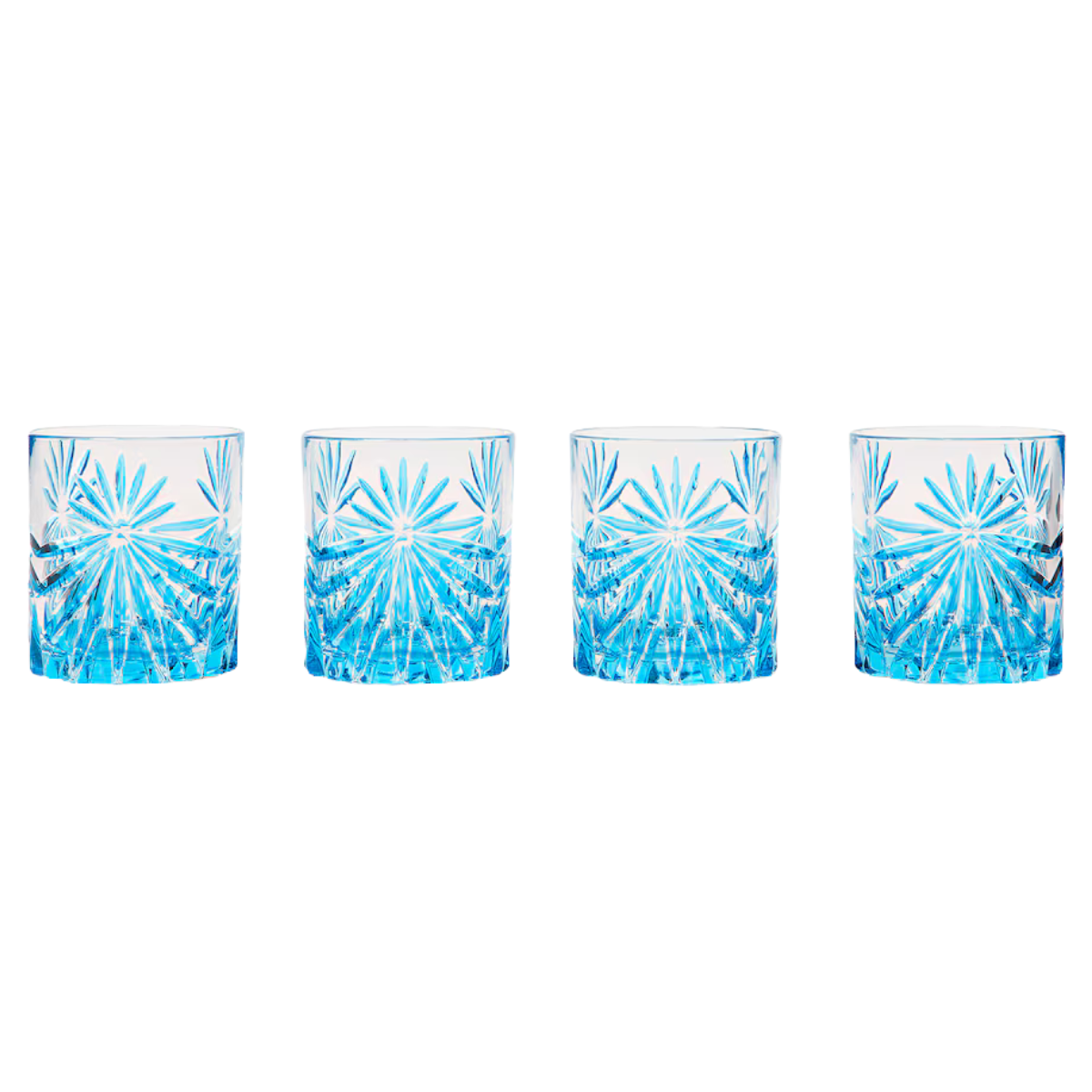 a set of 4 crystal tumblers with blue petal patterns