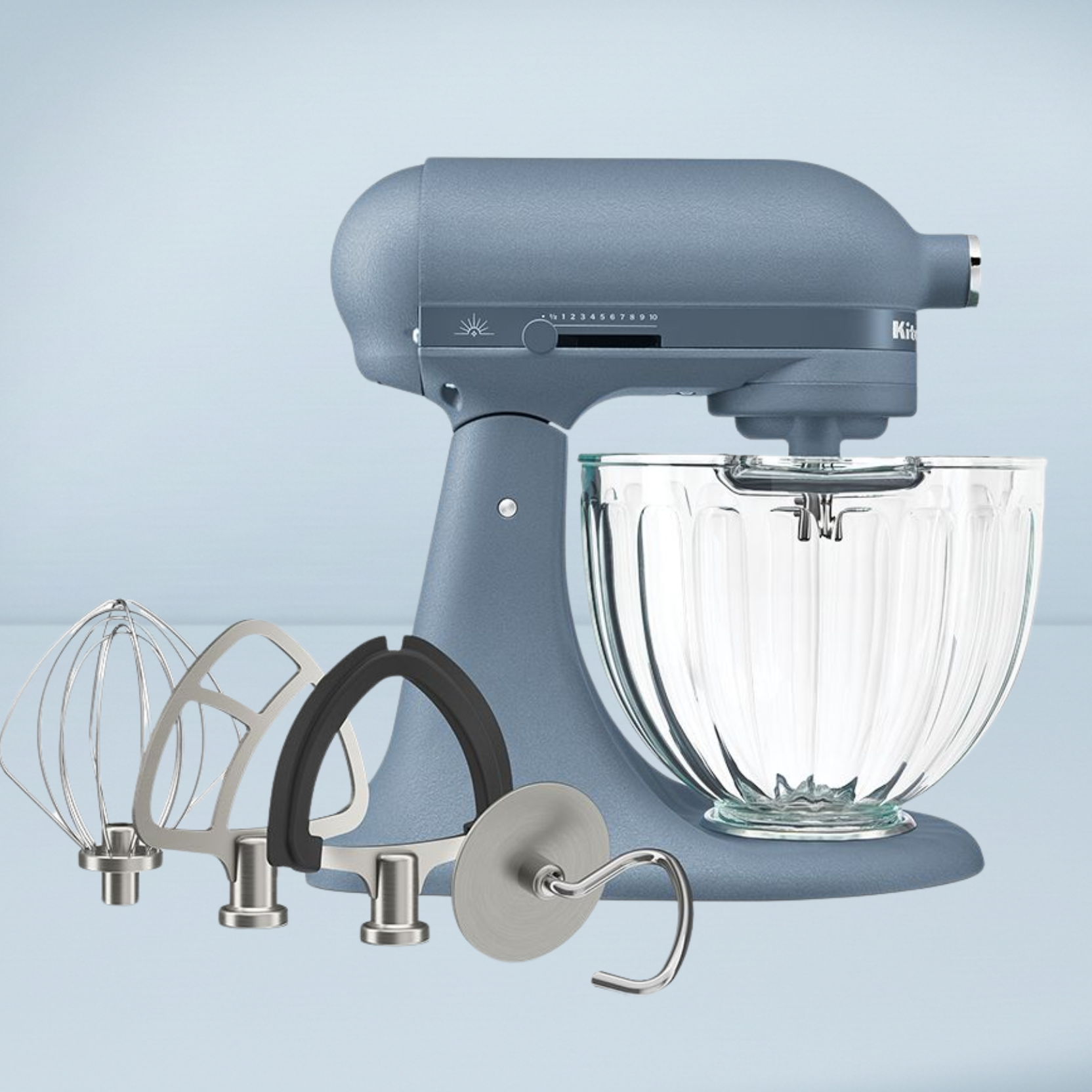 blue kitchenaid stand mixer with attachments and ribbed glass bowl
