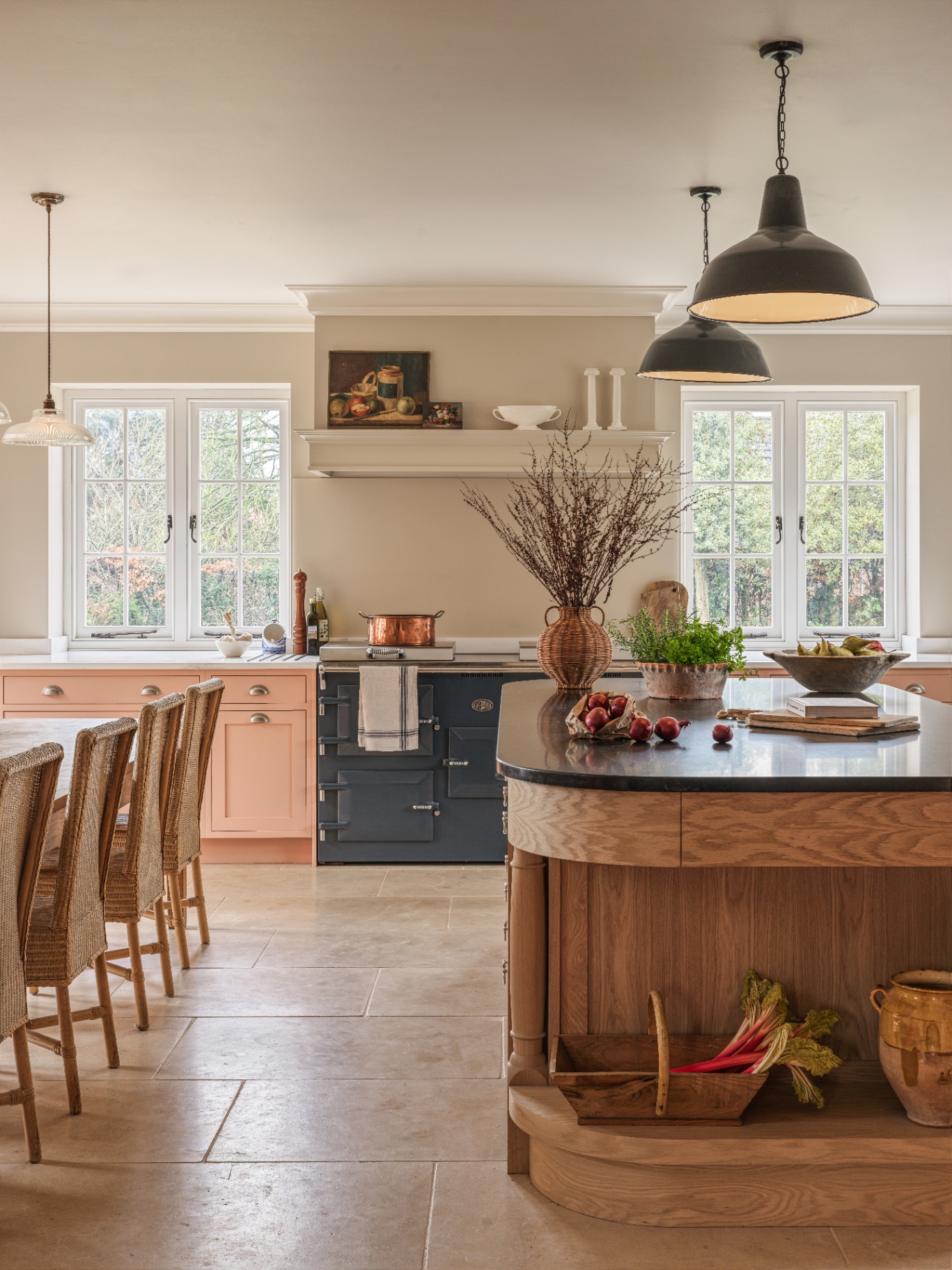 bespoke kitchen design by Cheverell, a statement oak island is balanced by painted cabinetry and an Everhot 150 Series range cooker 