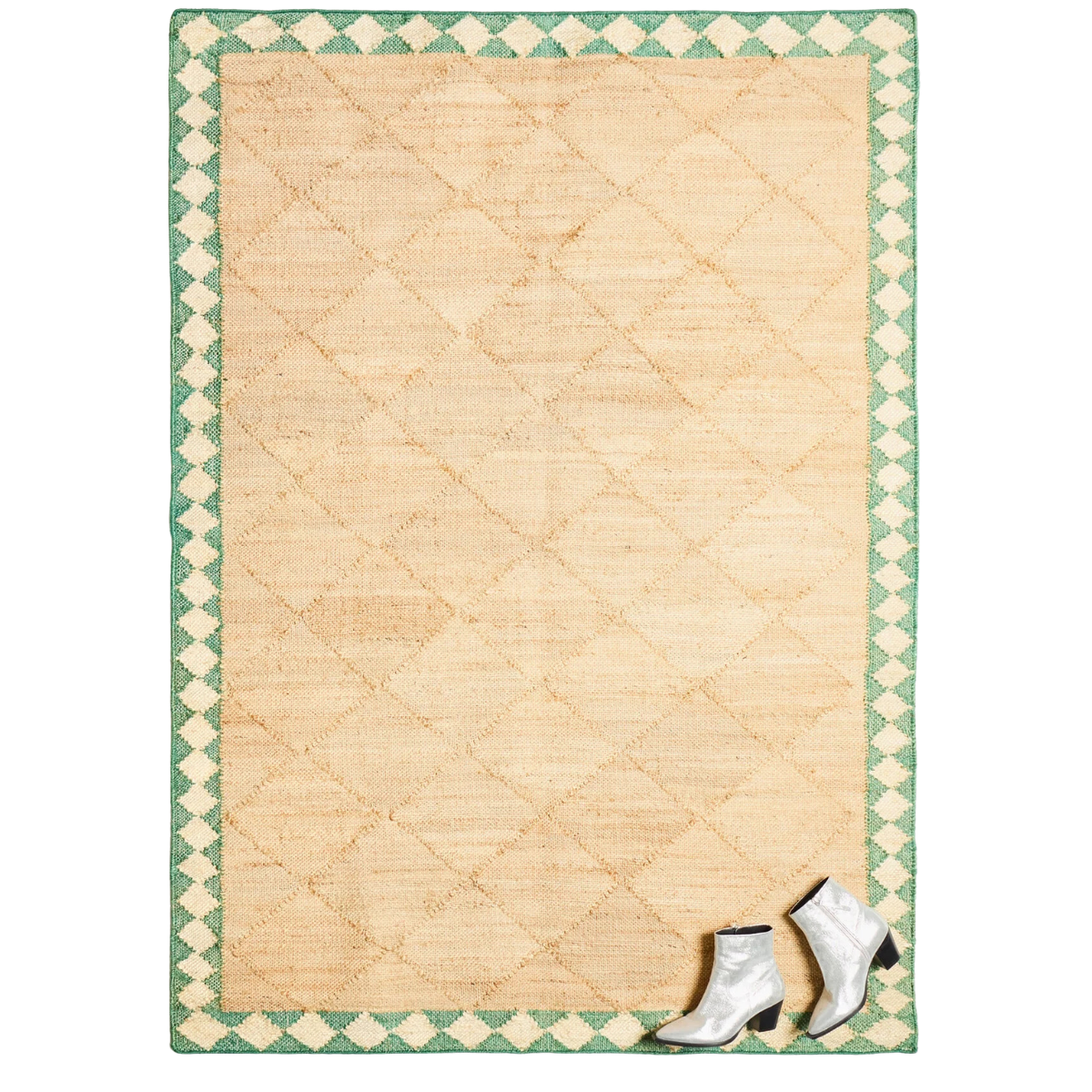 a jute rug with a green diamond border