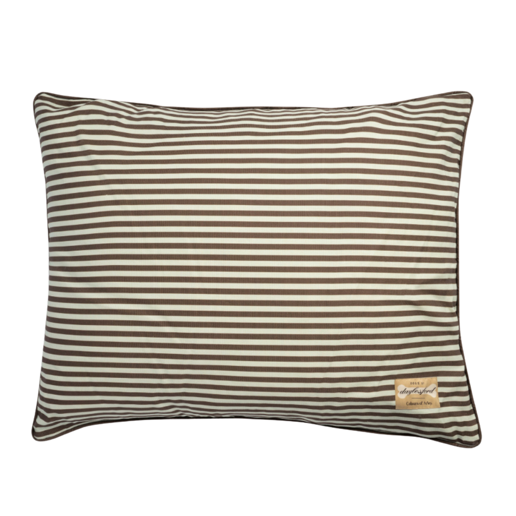 a white and brown stripe dog cushion bed with a daylesford bone logo