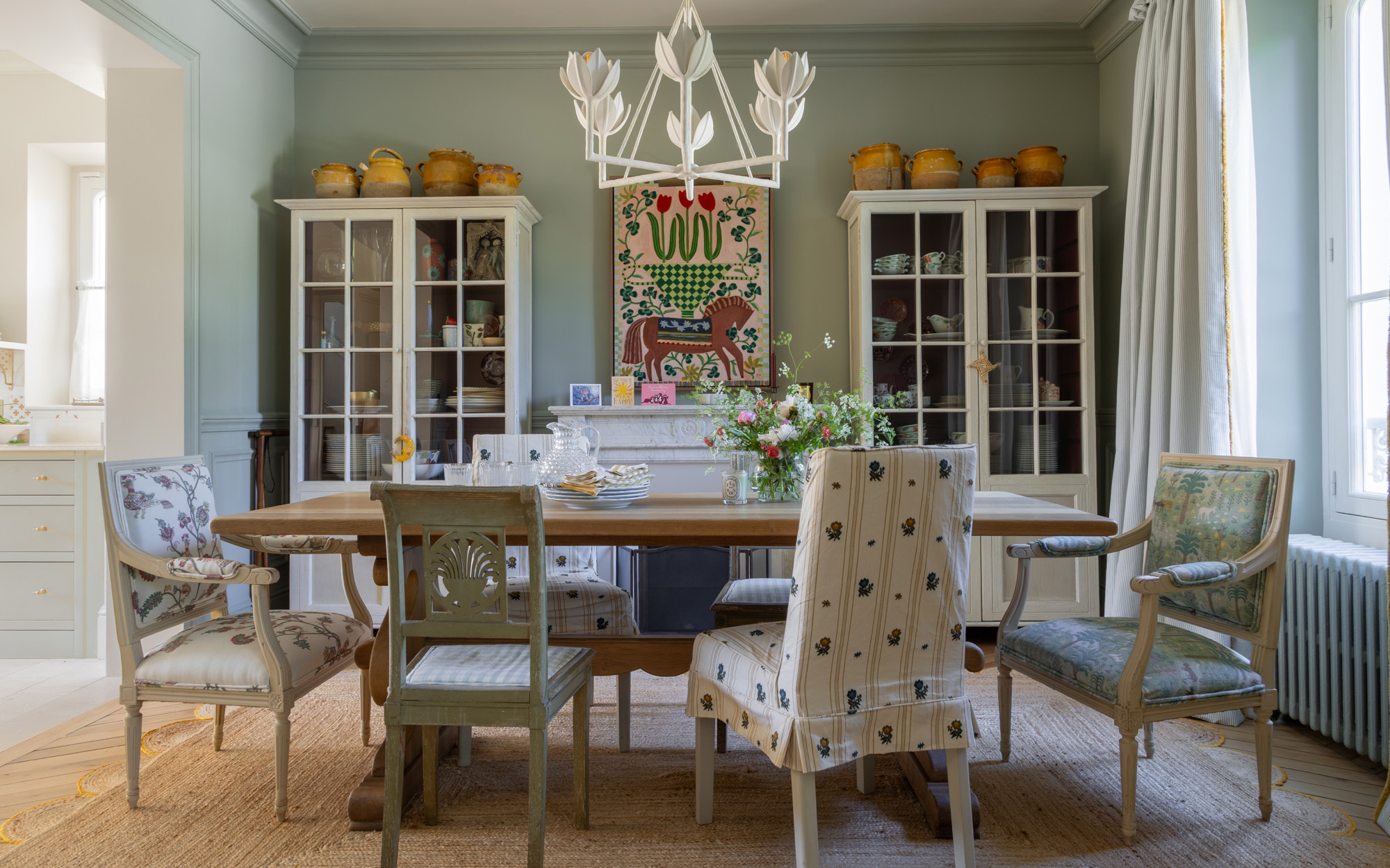 a dining room table and chairs