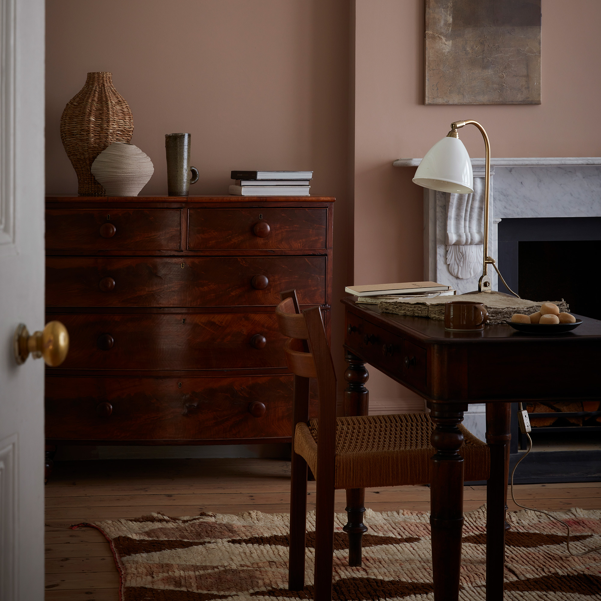 a dining room with an antique mahogany side board