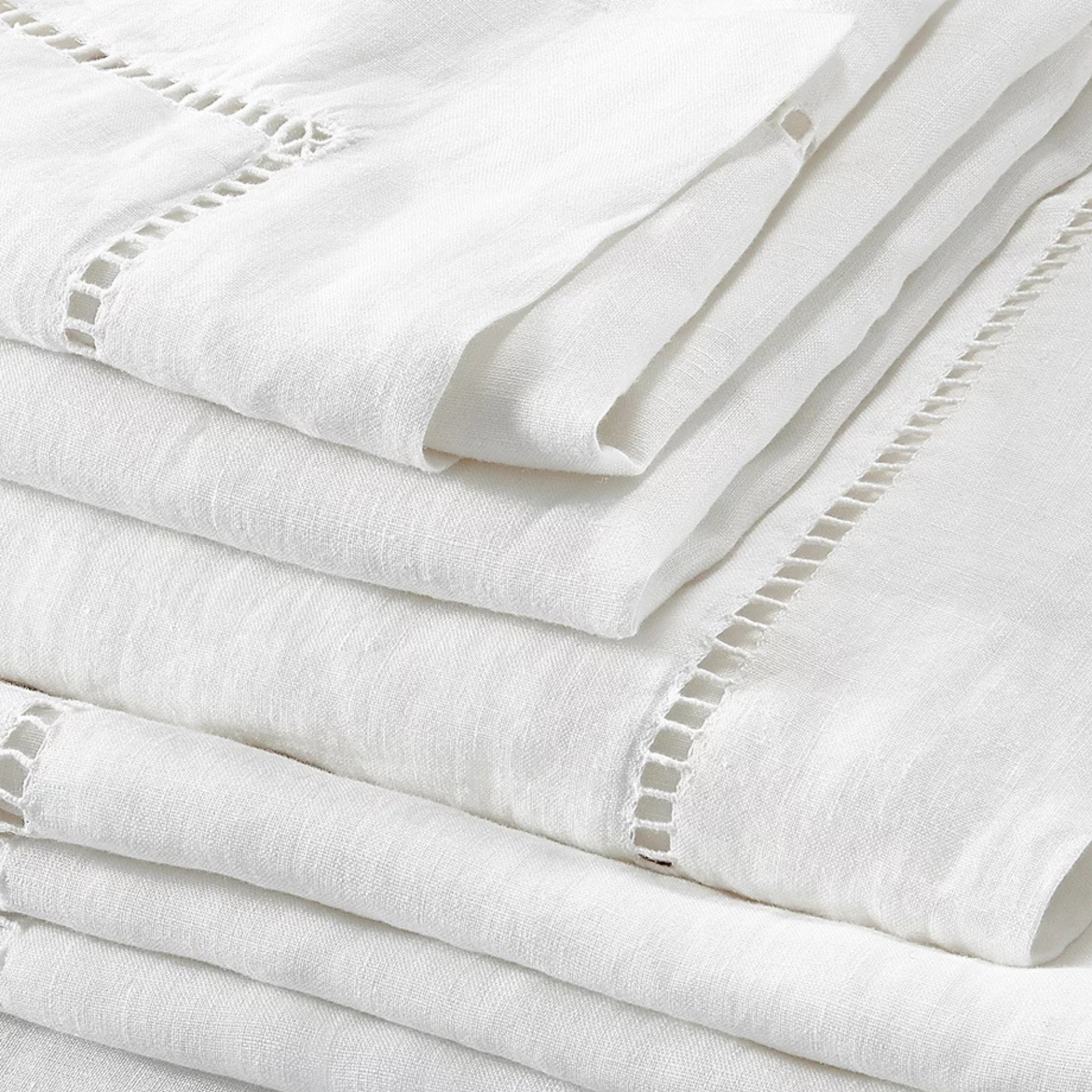 flat sheet pictured from the white company with greek linen details