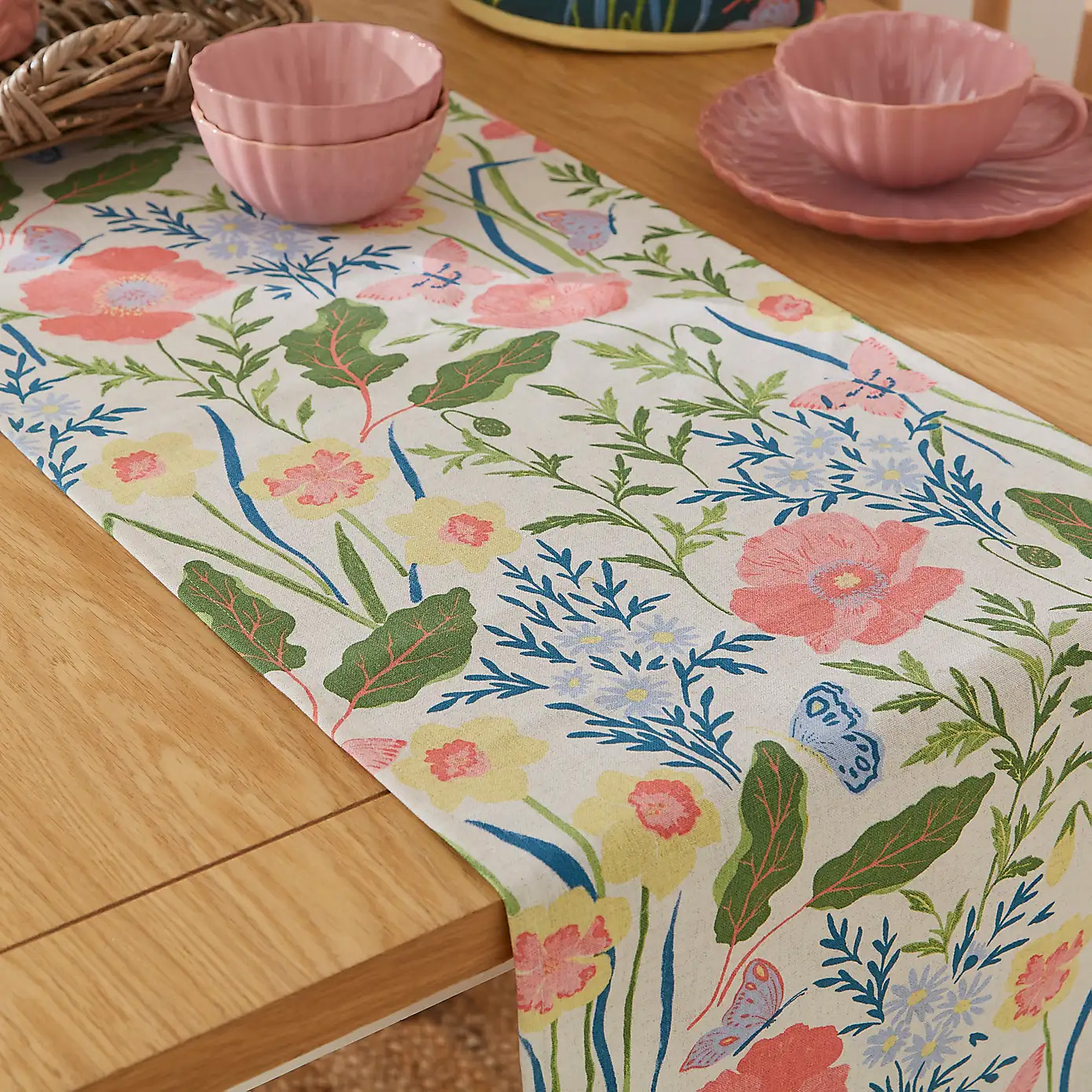 a table runner with colourful floral print