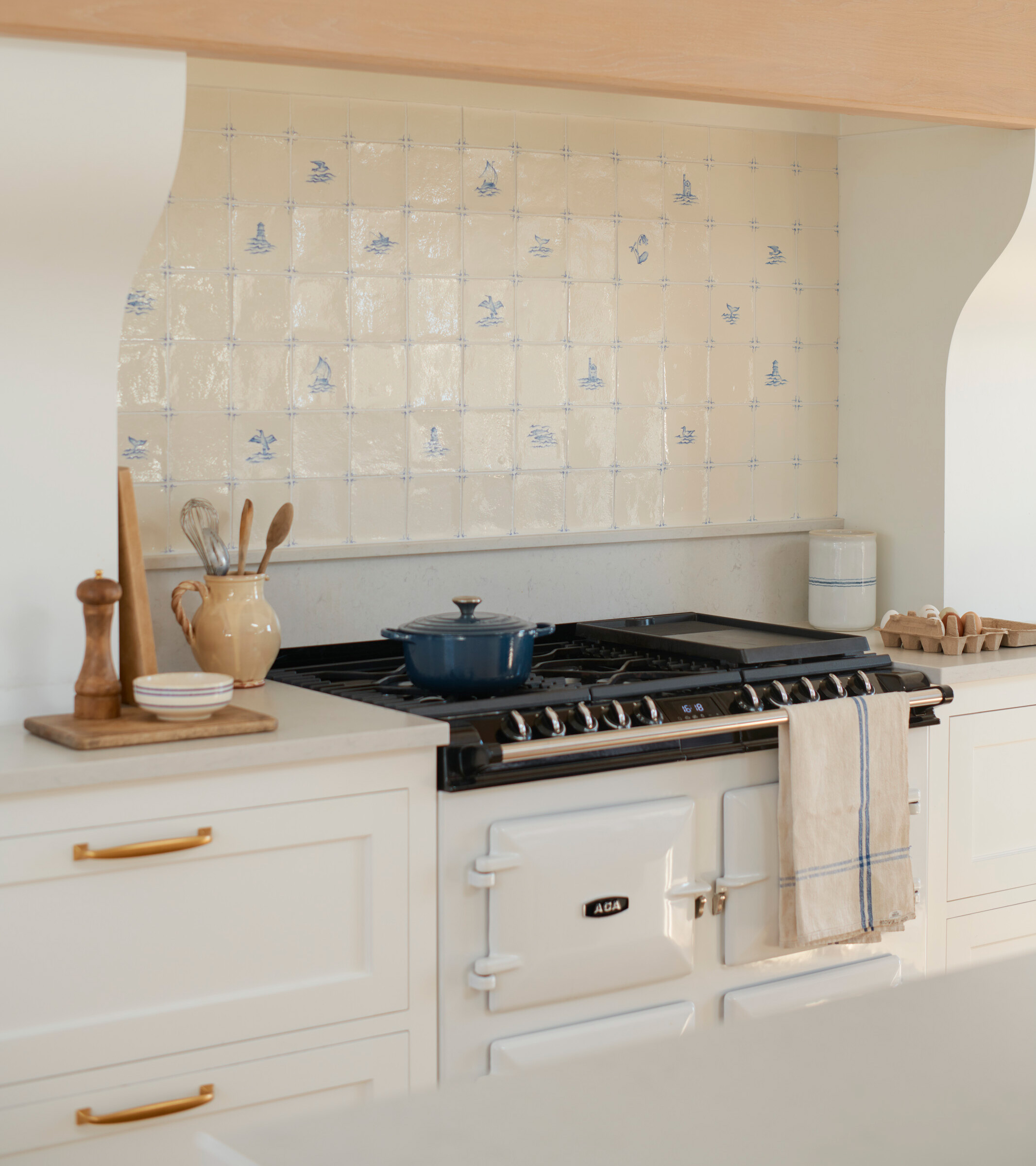 tiled splashback above an aga